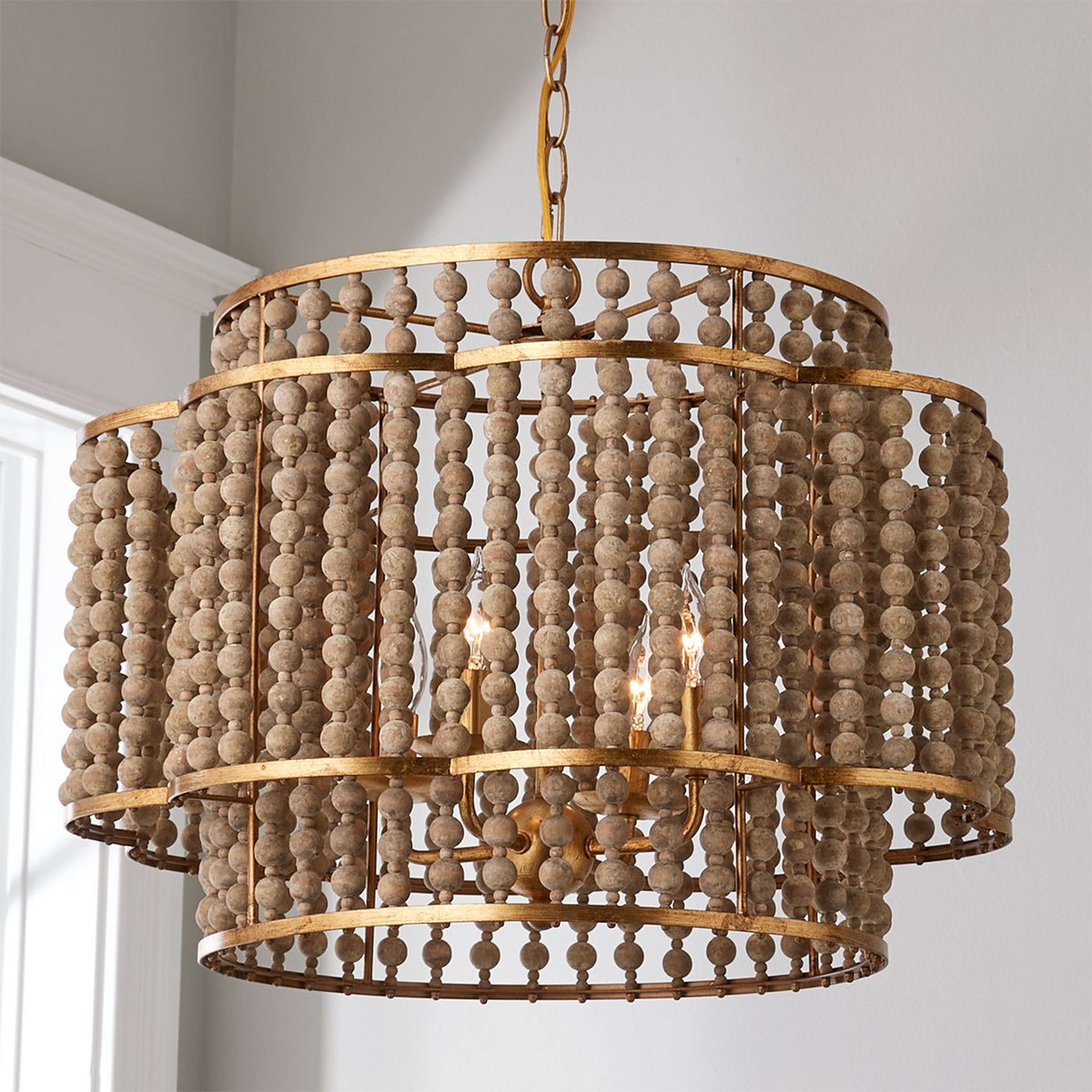 A Rustic Beaded Layered Petal Chandelier with Gold Leaf / Aged Wood color