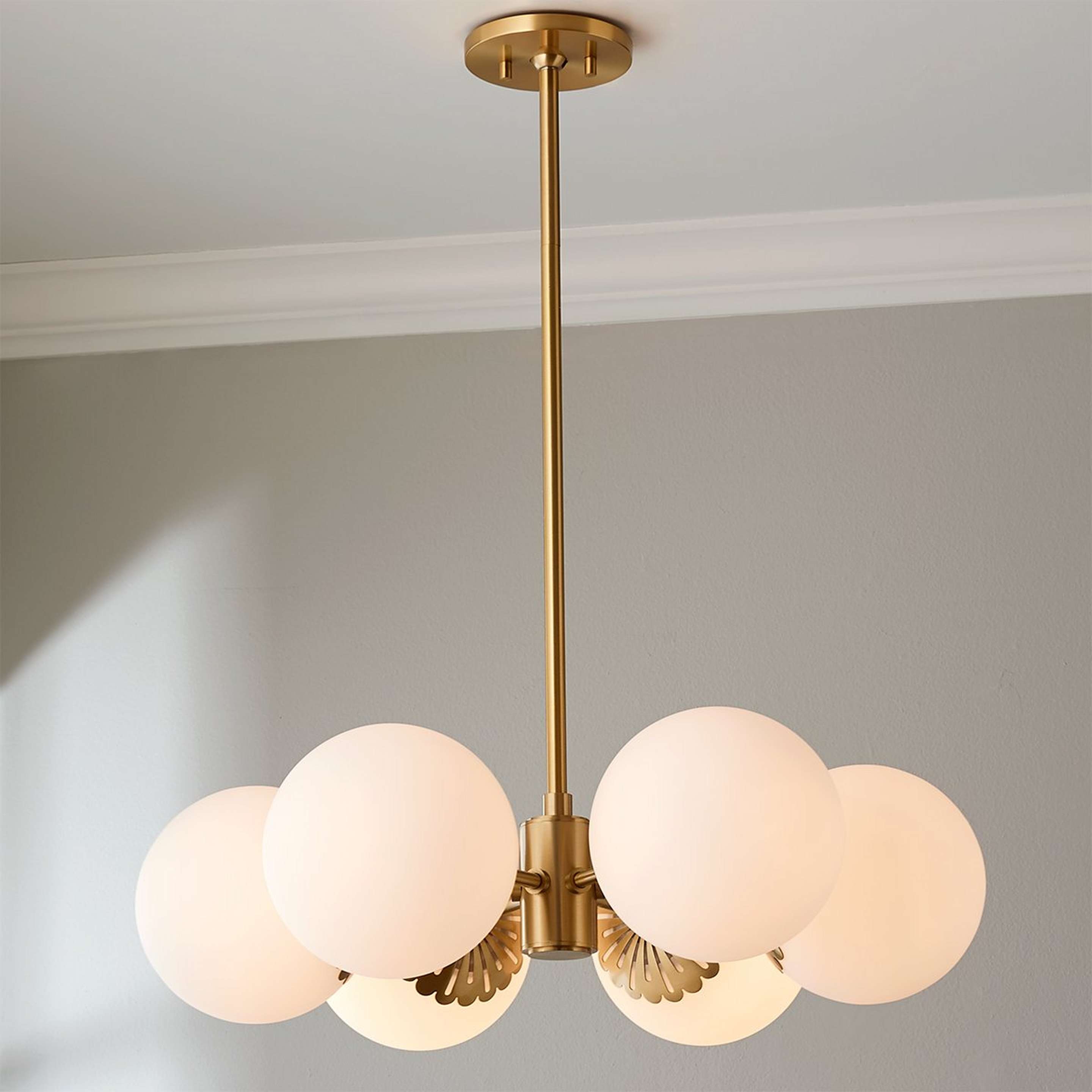 A Dewdrop Globe Chandelier with Satin Brass color