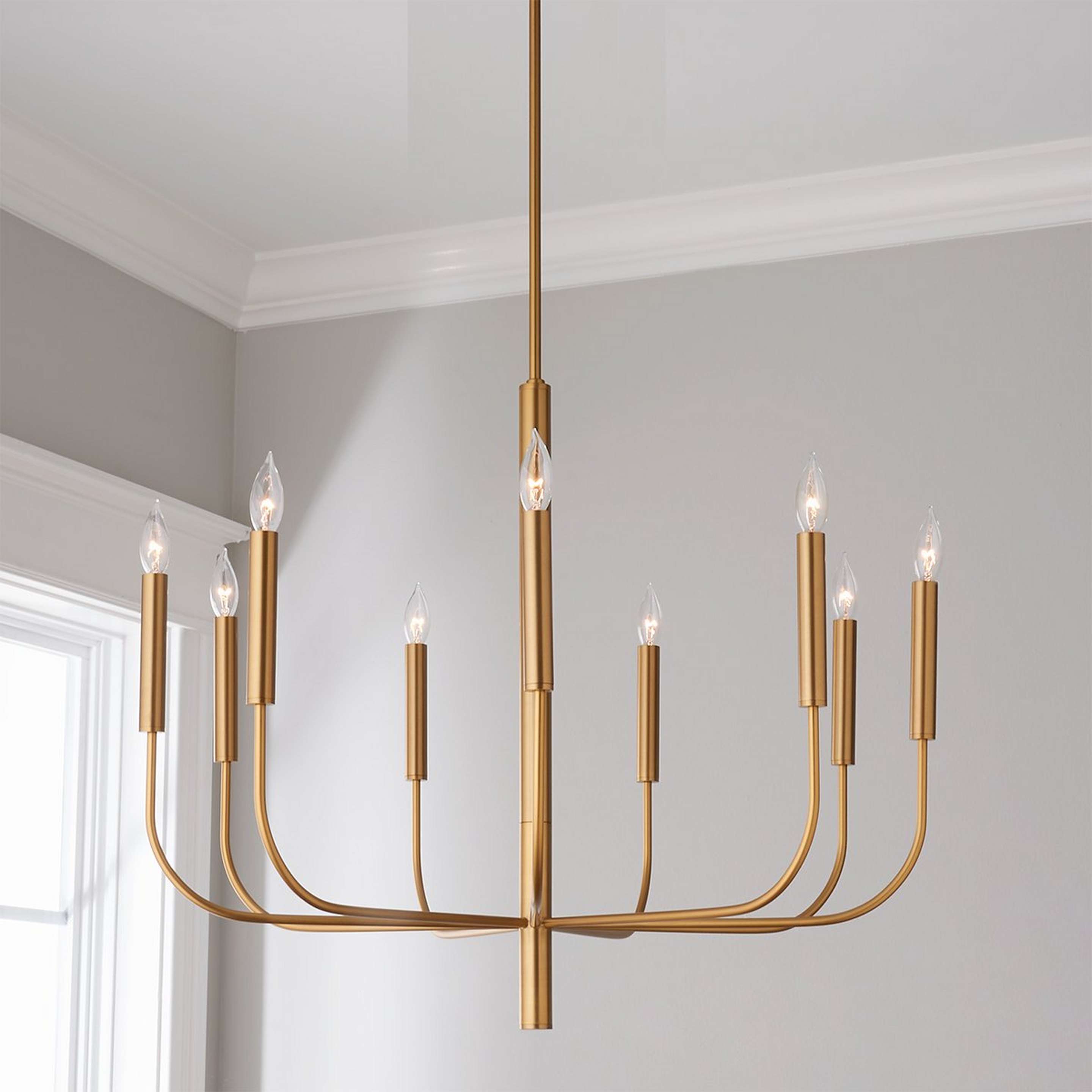 A ED Ellen DeGeneres Brianna 9 Light Chandelier with Burnished Brass color