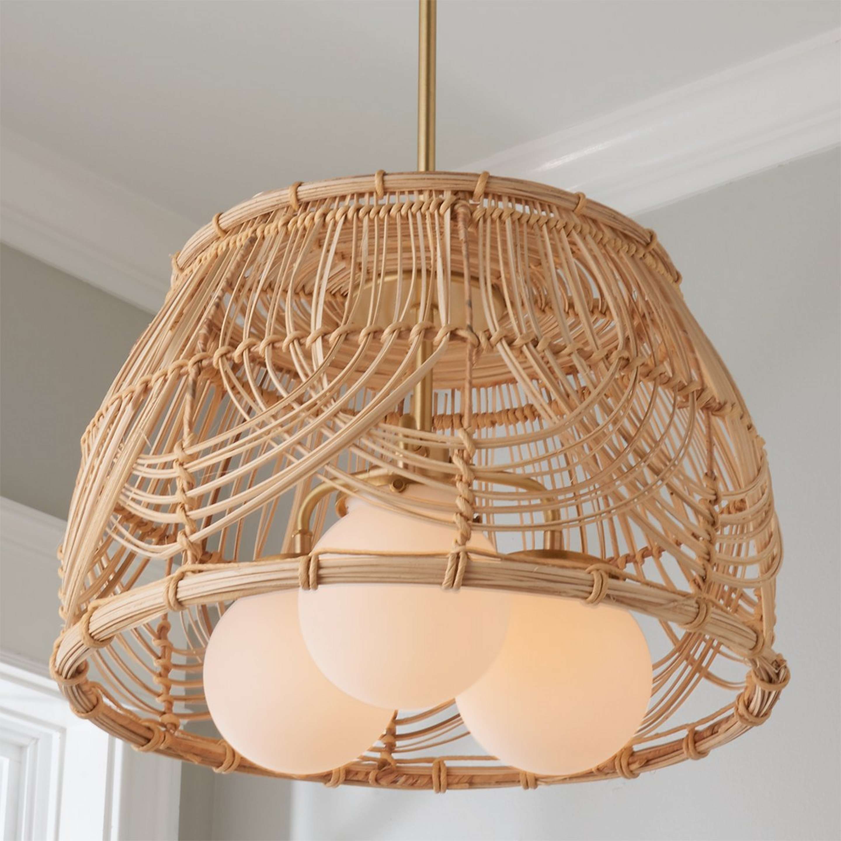 A Serene Deco Chandelier with Raw Brass / Seagrass / White Glass color