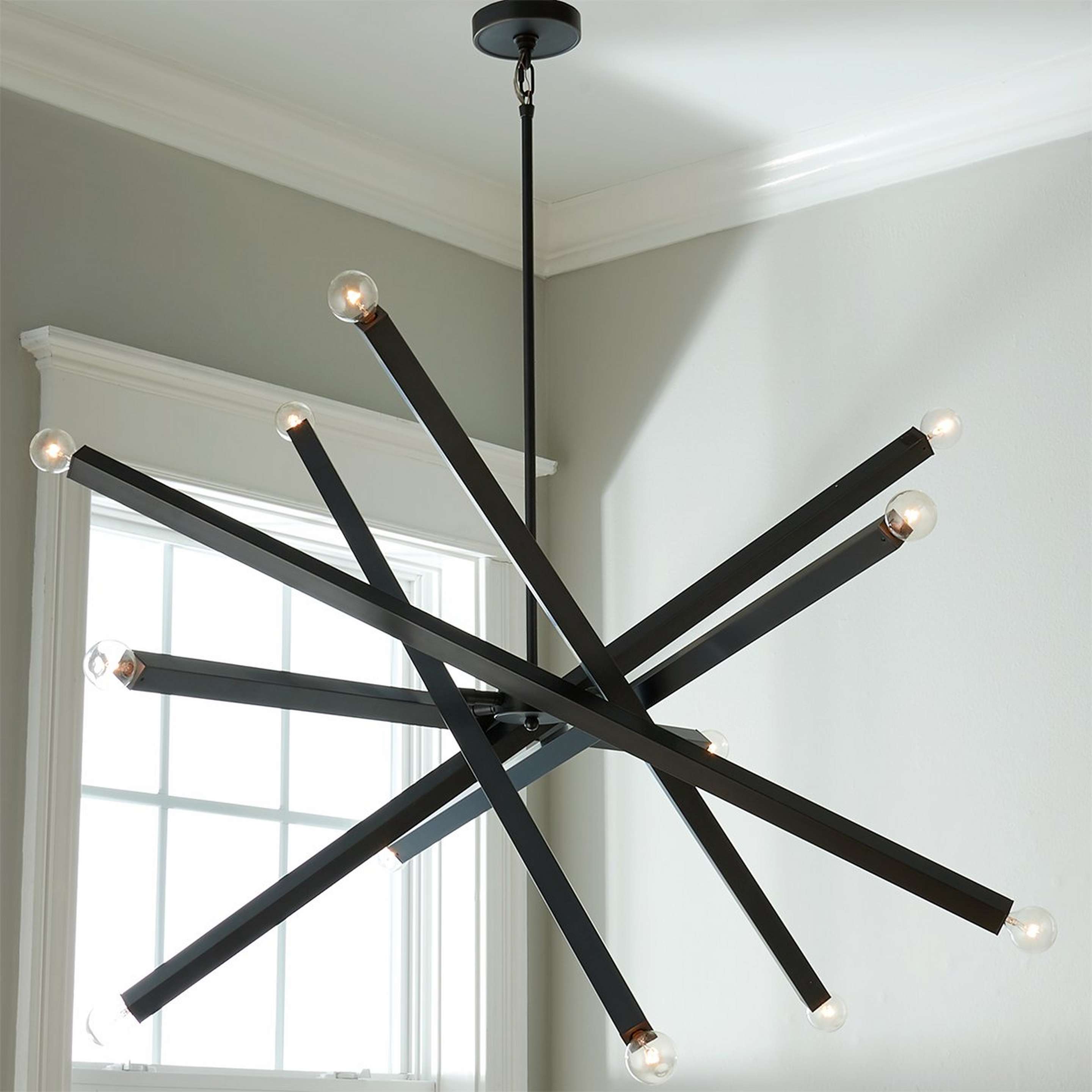 A Barre Chandelier with Oil Rubbed Bronze color