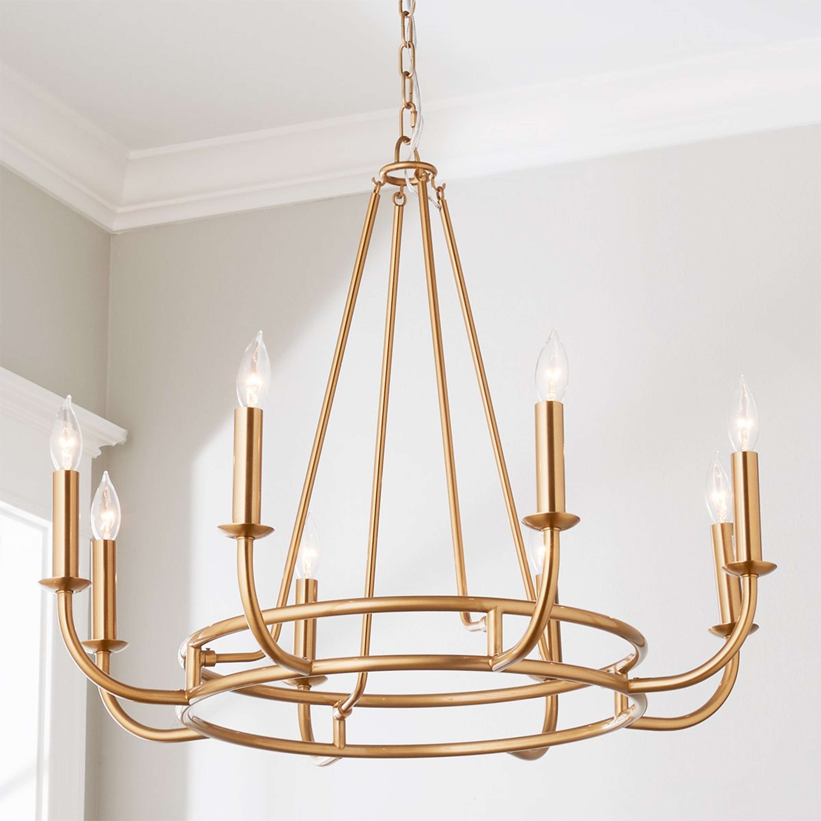 A Moderately Modern Chandelier with Aged Brass color