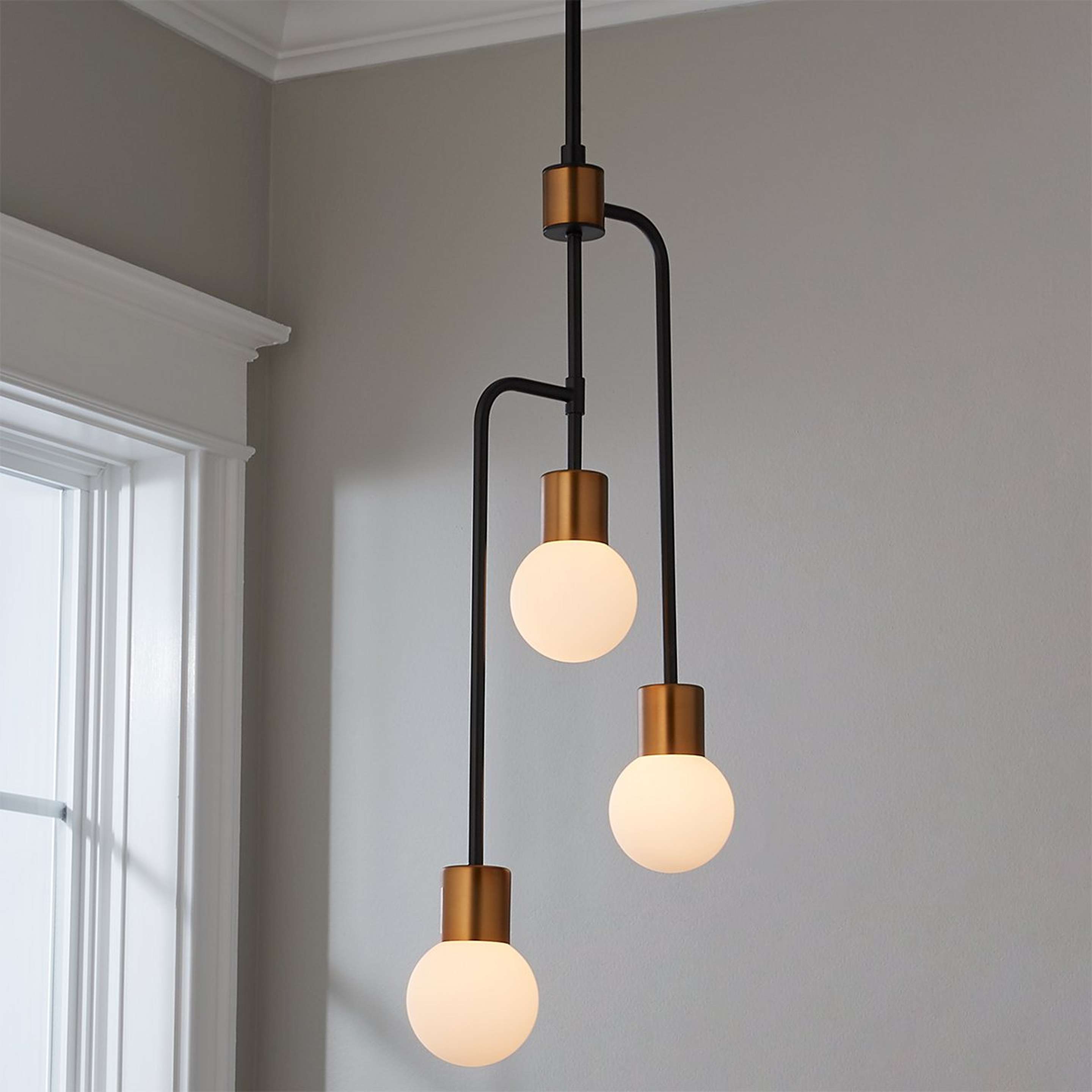 A Industrial Cinch Chandelier with Black / Brass color