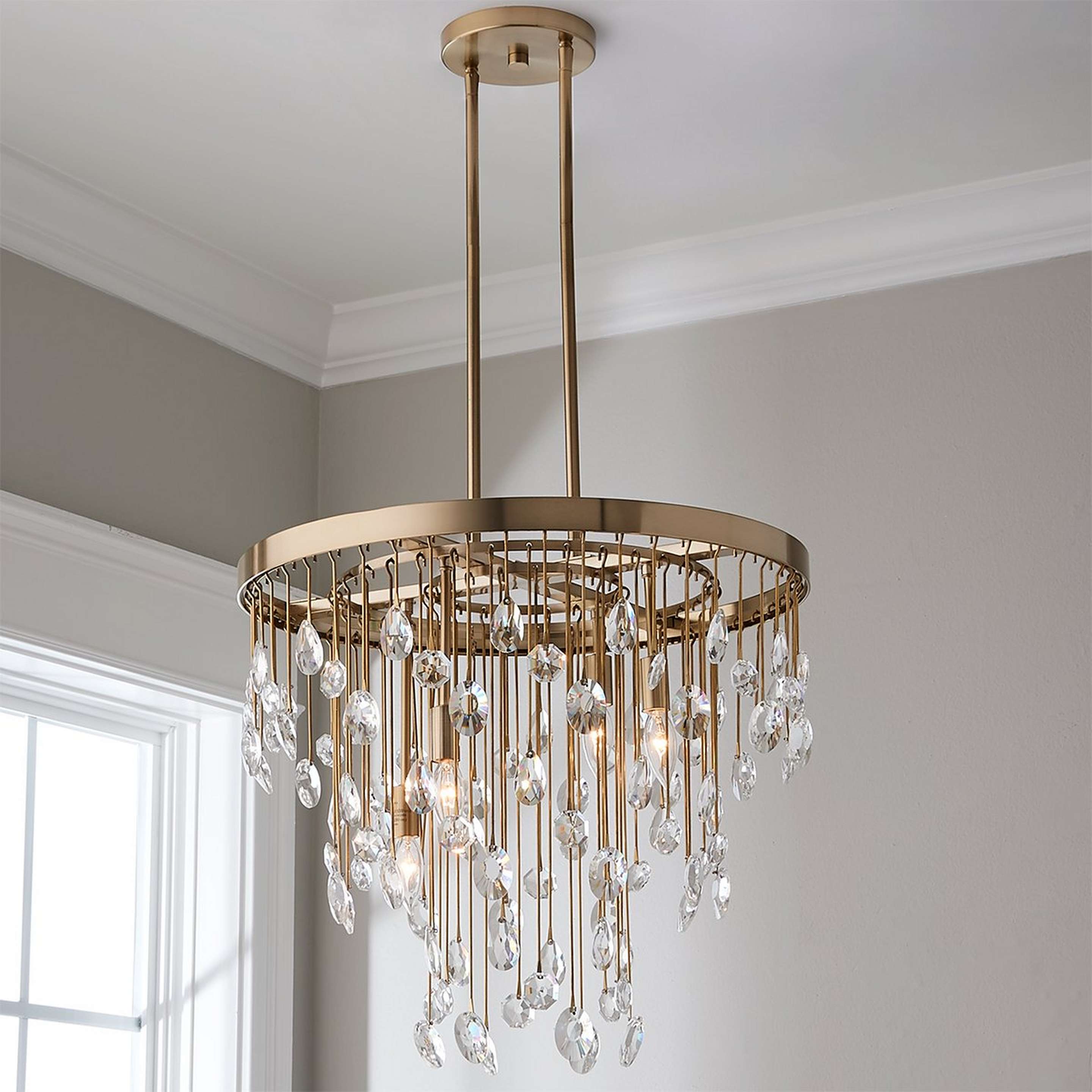 A Crystal Springs Chandelier with Champagne Brass / Crystal color