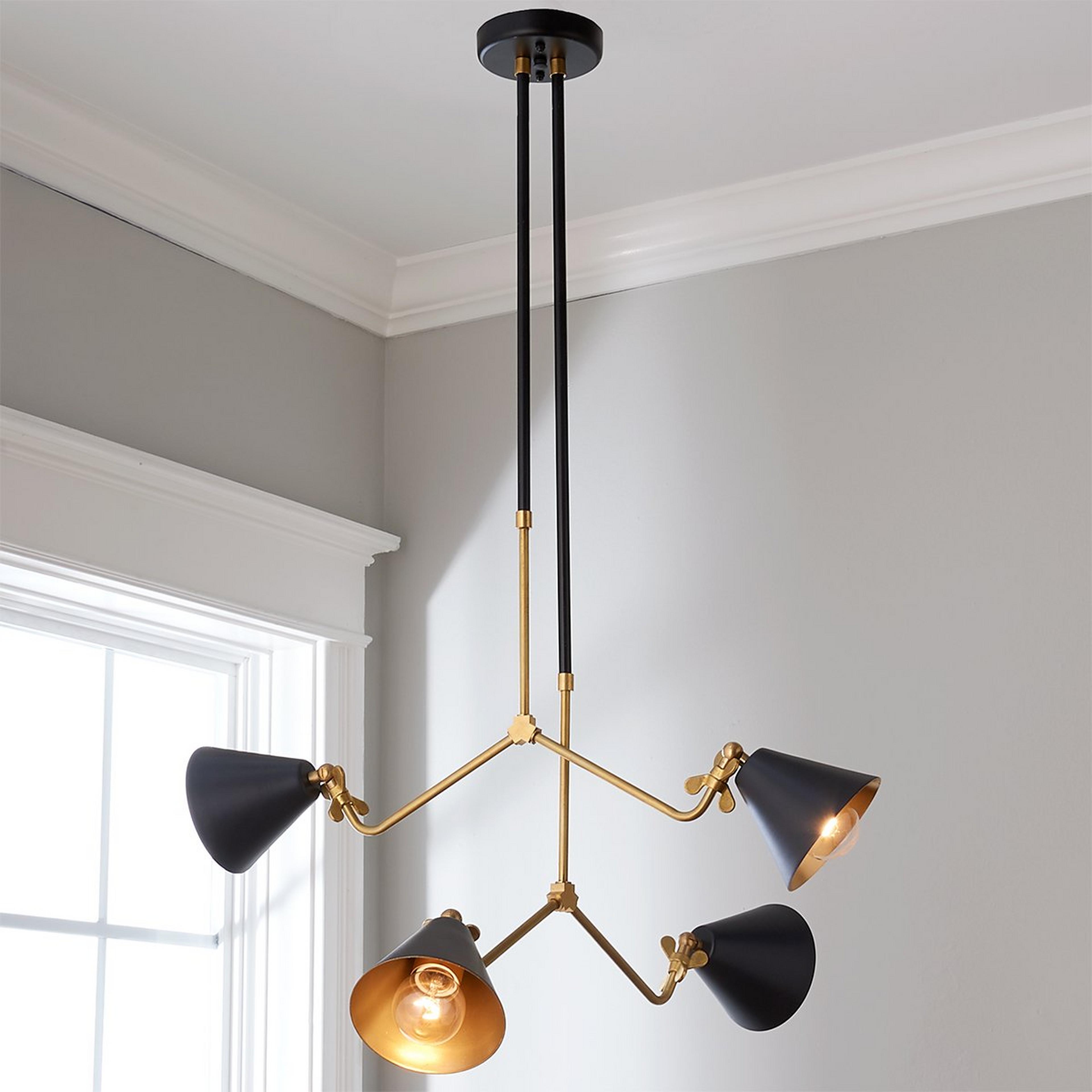 A Wendy Umanoff Flutter Chandelier with Black / Gold  color
