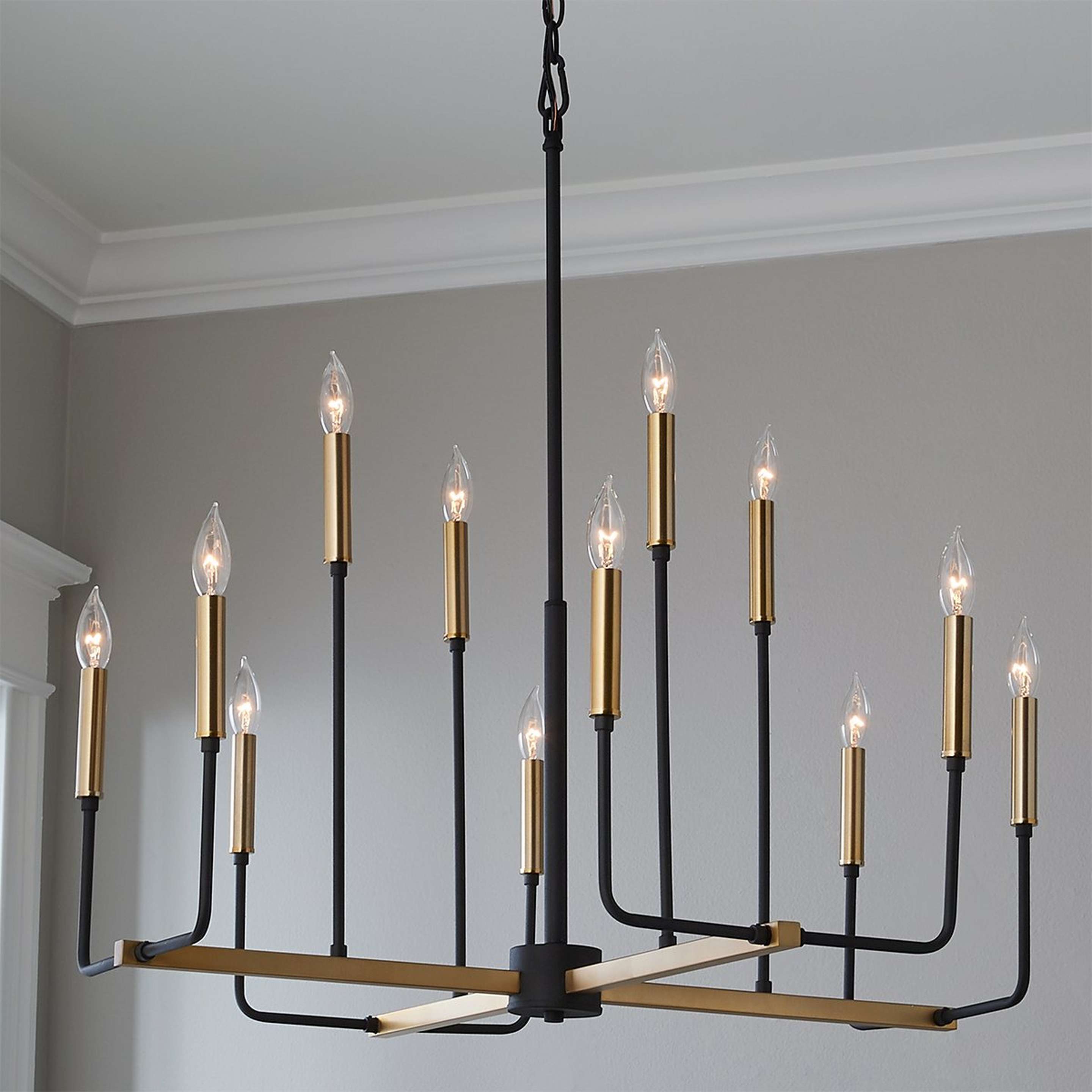A Level Linear Chandelier with Black / Aged Brass color