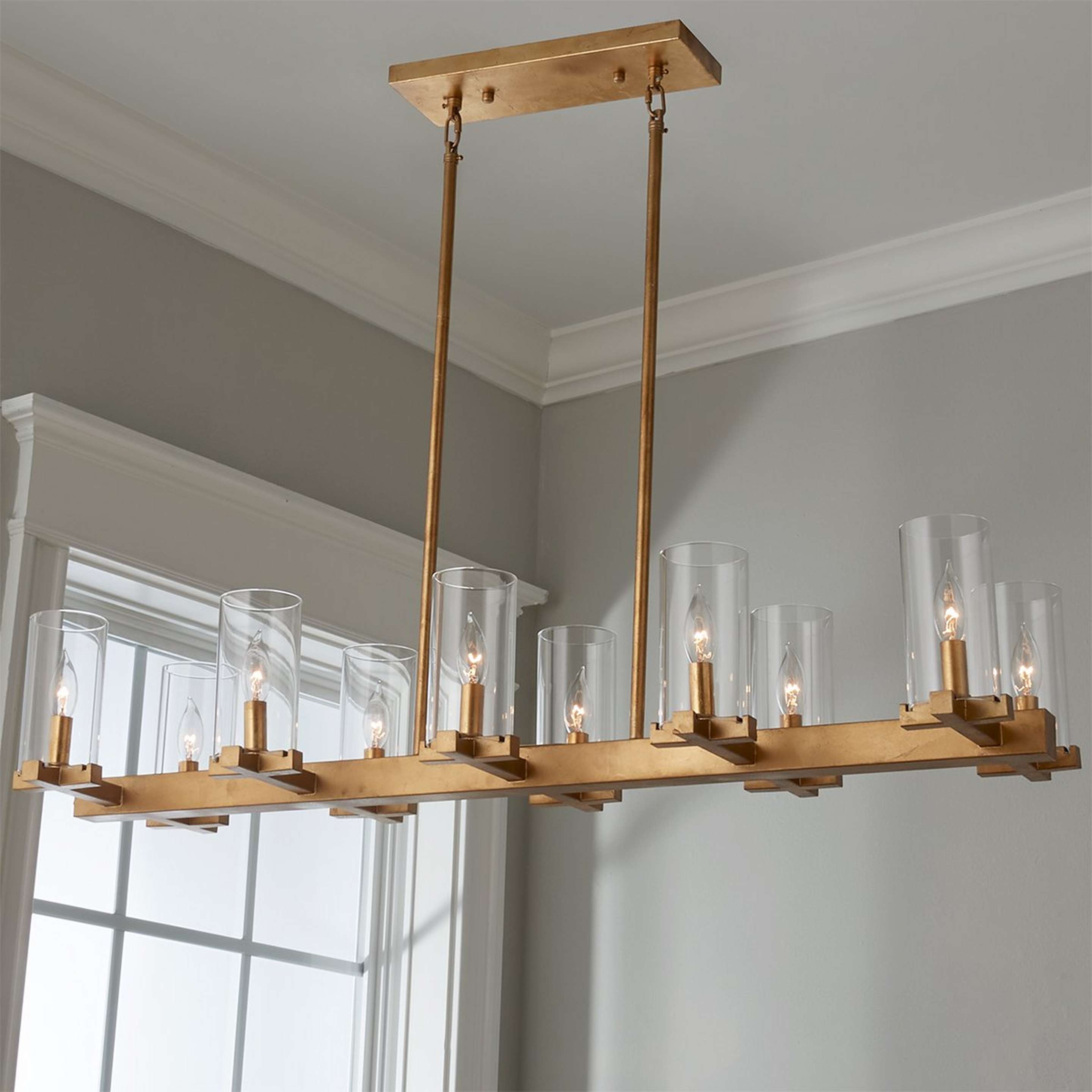 A Mod Regency Island Chandelier with Aged Gold color