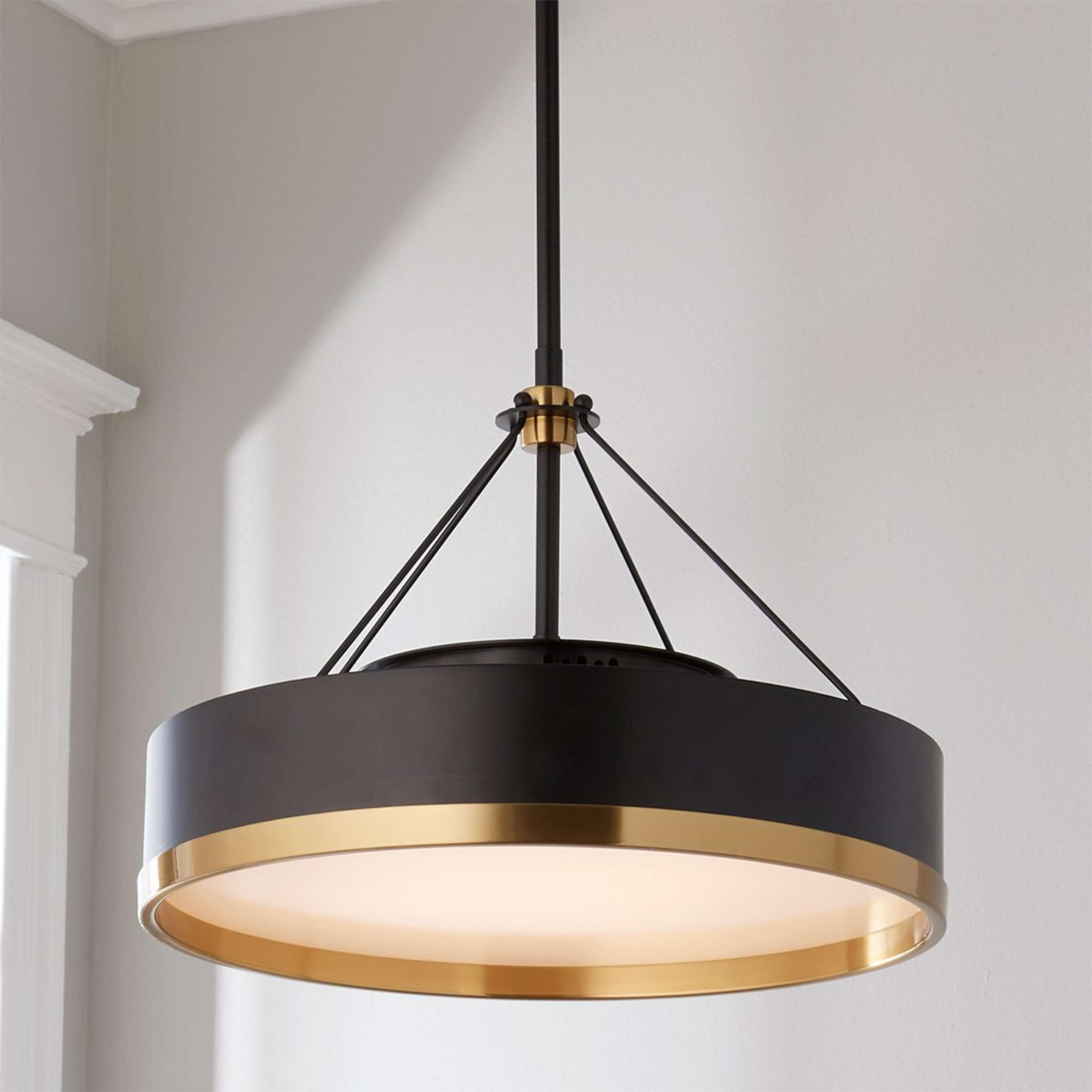 A Liam Chandelier with Matte Black / Brass color