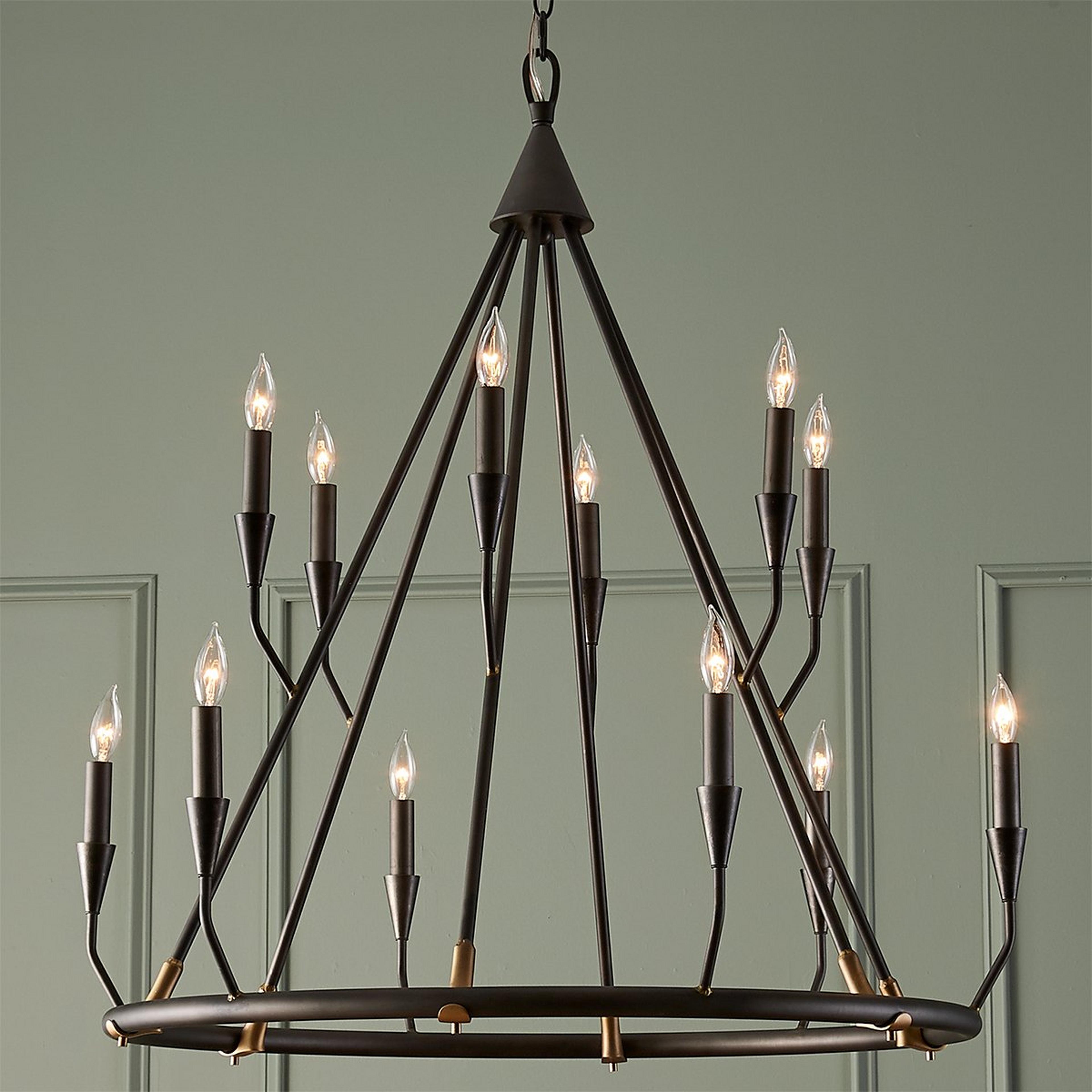 A Gilded Solder Chandelier with Blackened Steel / Gold color