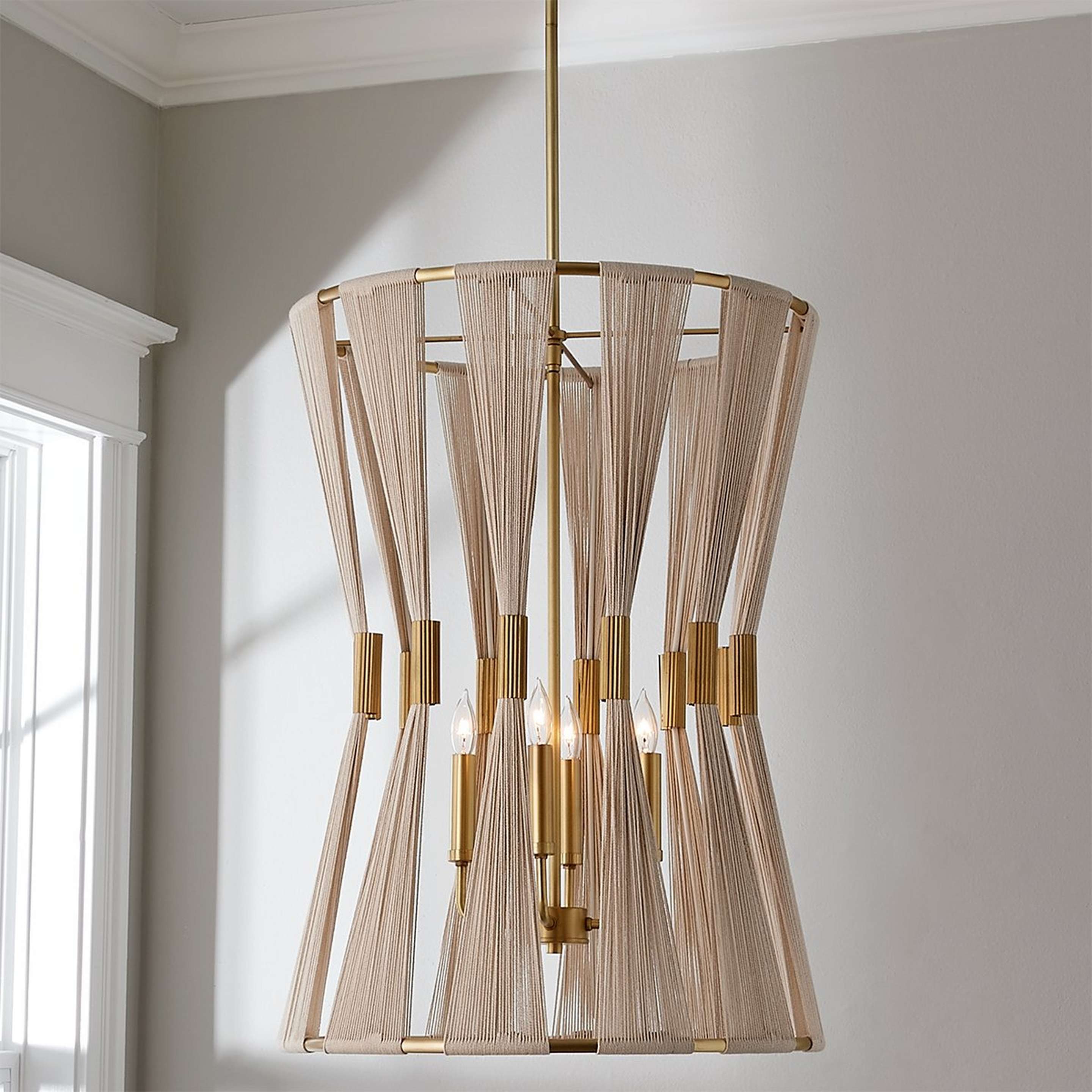 A Axel Foyer Chandelier with Brass / Natural Ivory Rope color