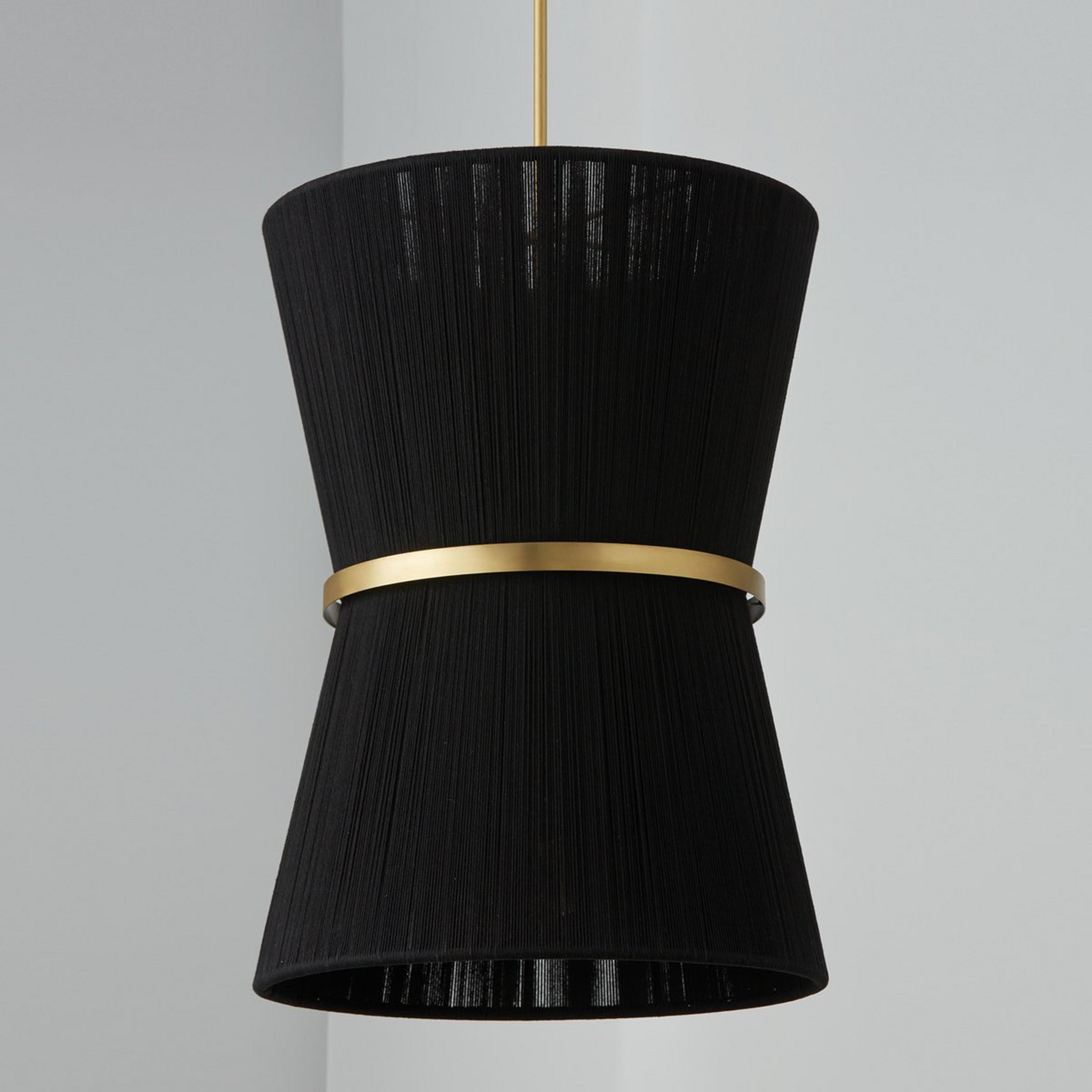 A Halia Foyer Chandelier with Brass / Black Rope color