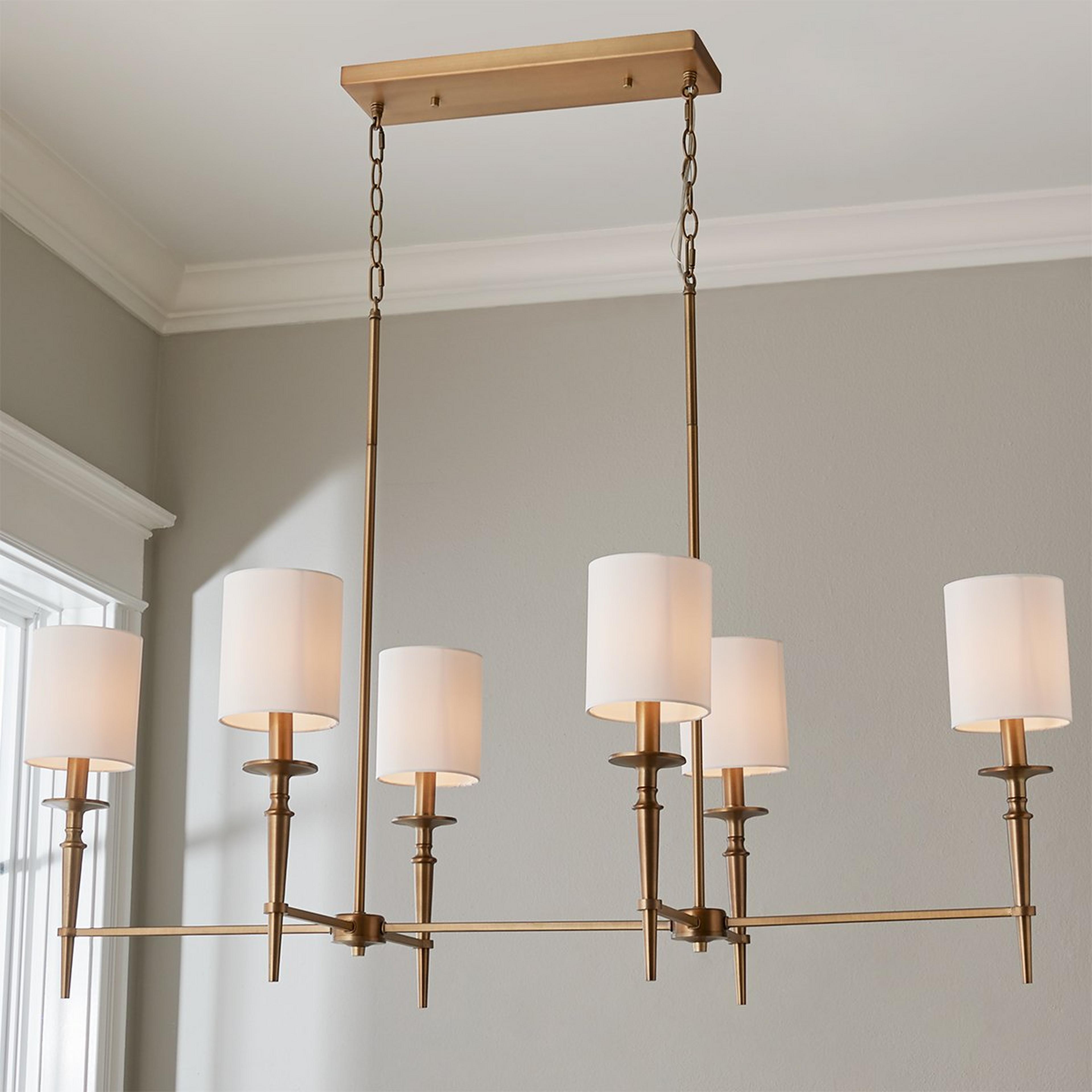A Bella Island Chandelier with Aged Brass color