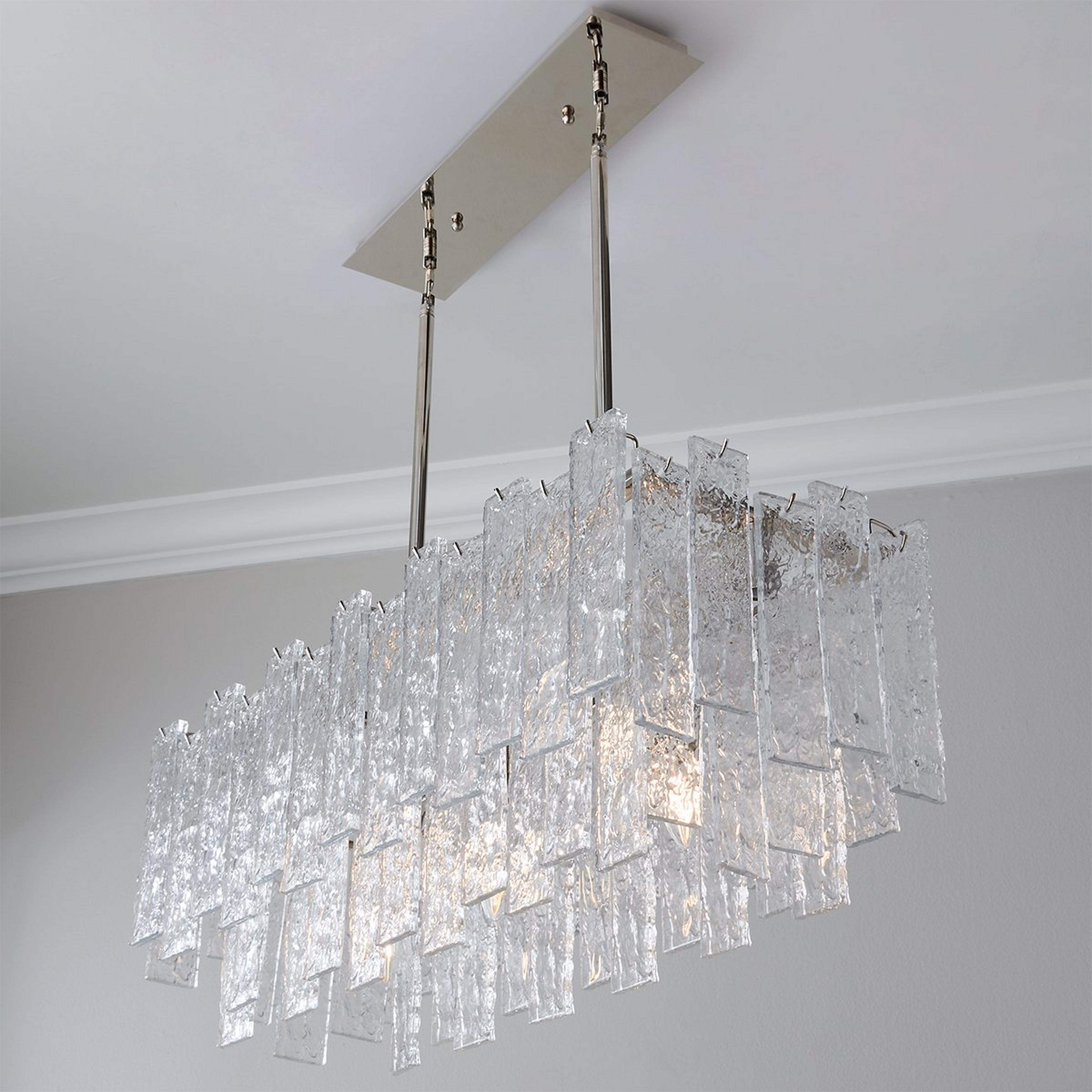 A Great Falls Island Chandelier with Polished Nickel / Textured Glass color