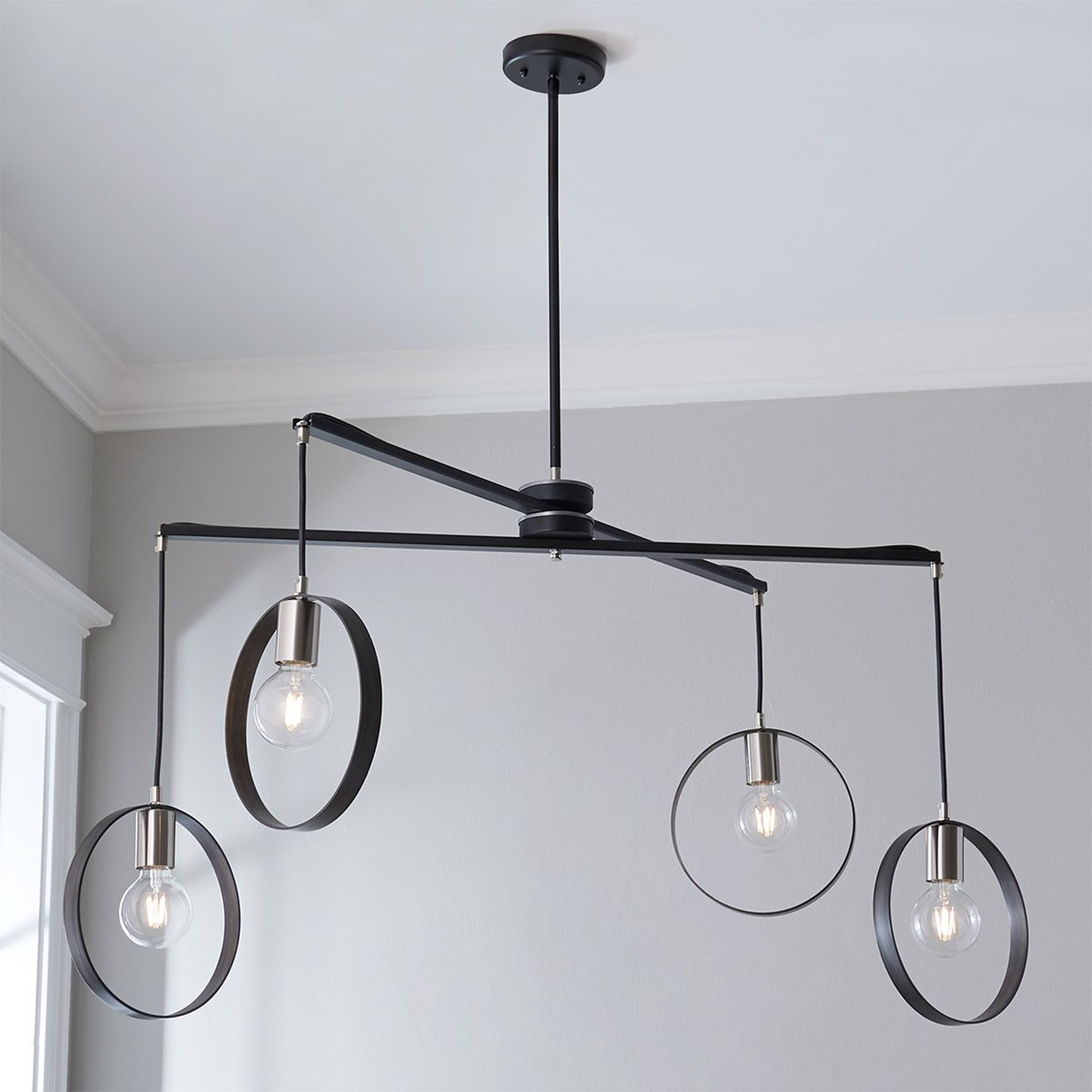 A Wendy Umanoff Cross Beam X Chandelier with Black / Satin Nickel color