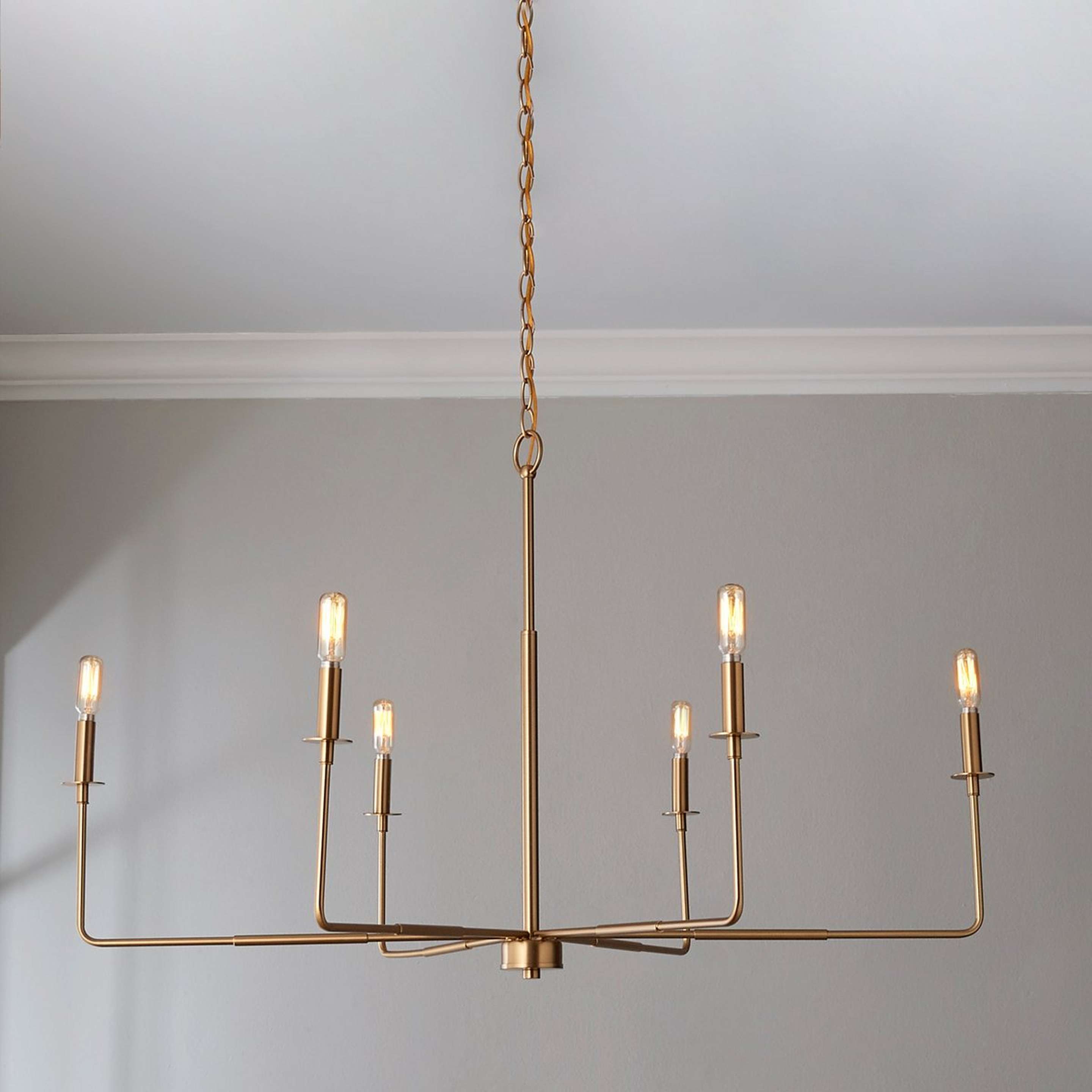 A Elongated Spoke Chandelier with Aged Brass color