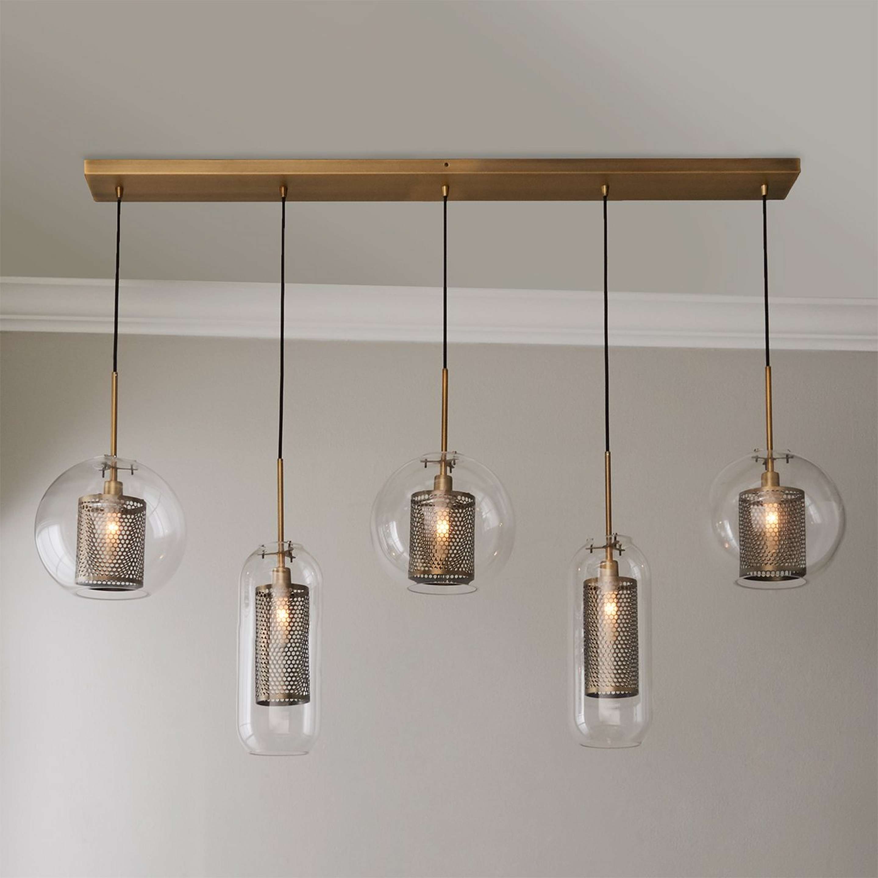 A Raphael Linear Chandelier with Aged Brass / Clear Glass color