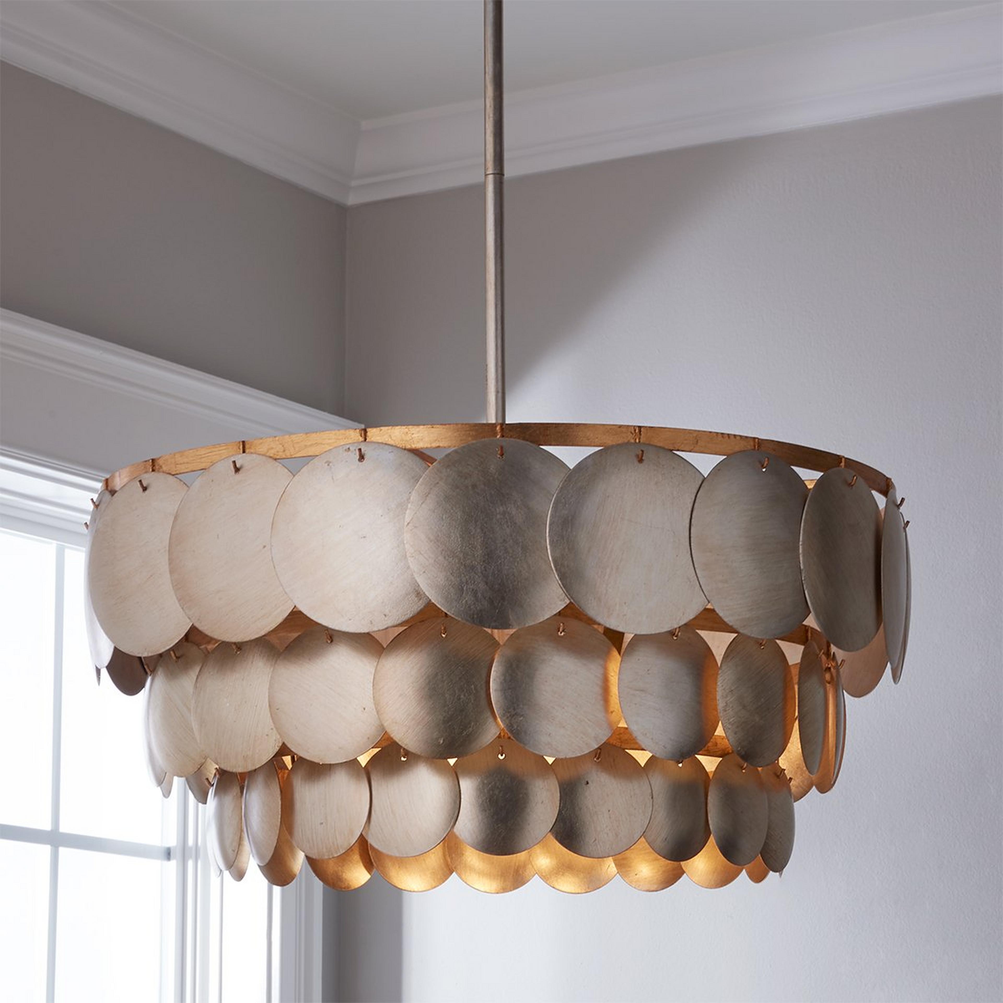 A Yanirah Chandelier with Champagne / Gold color