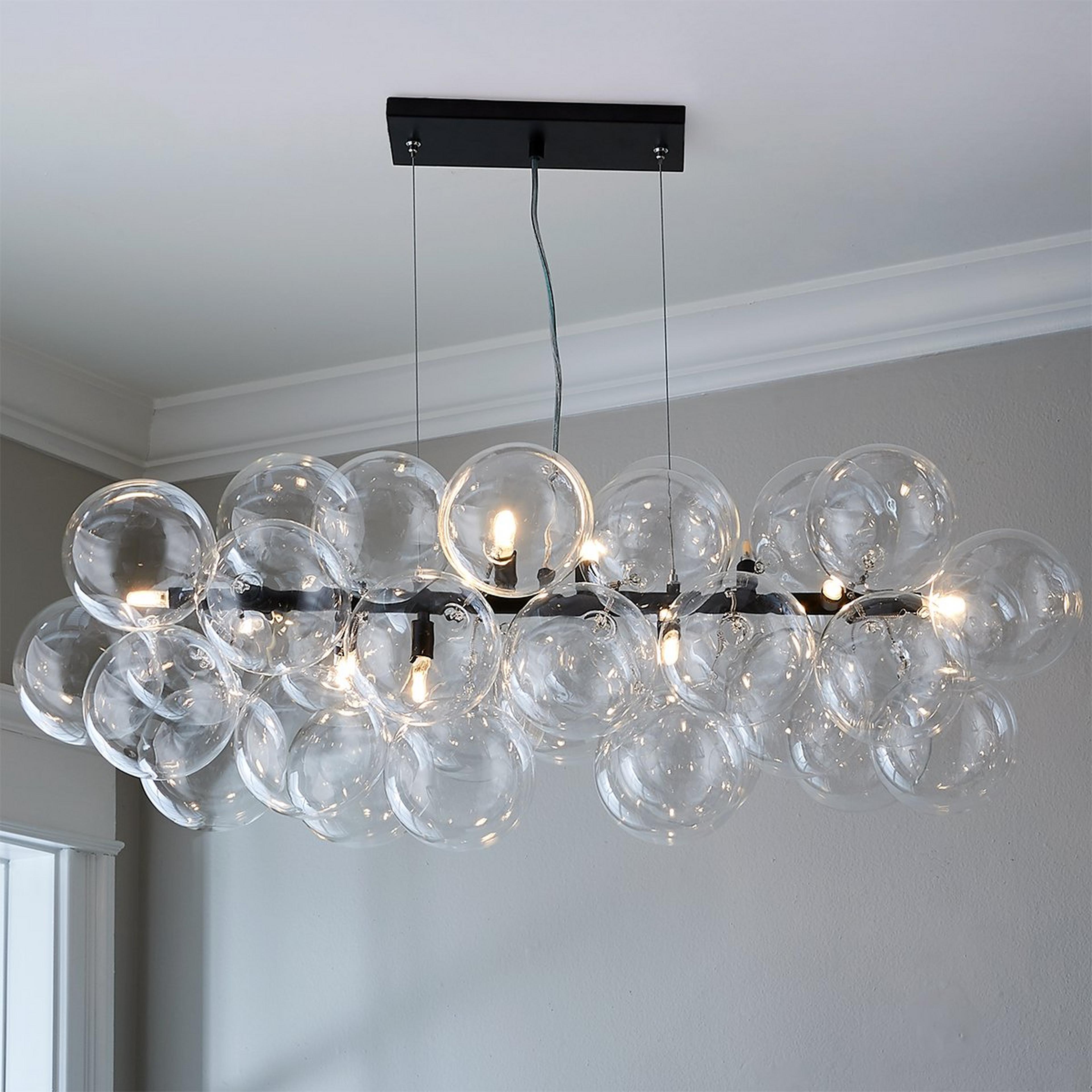 A Bowlby Island Chandelier with Matte Black / Clear Glass  color