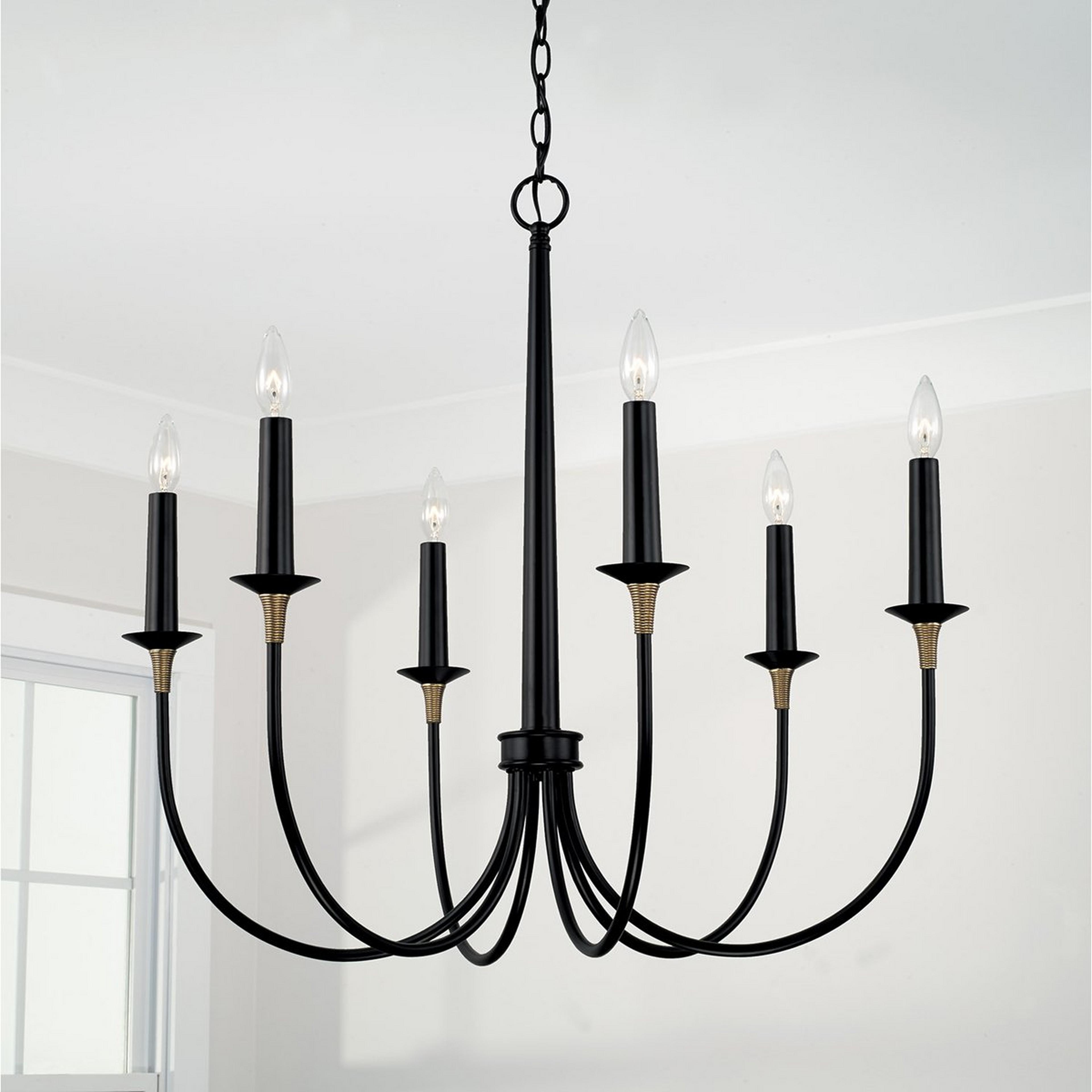 A Kaylix Chandelier with Matte Black / Brass  color