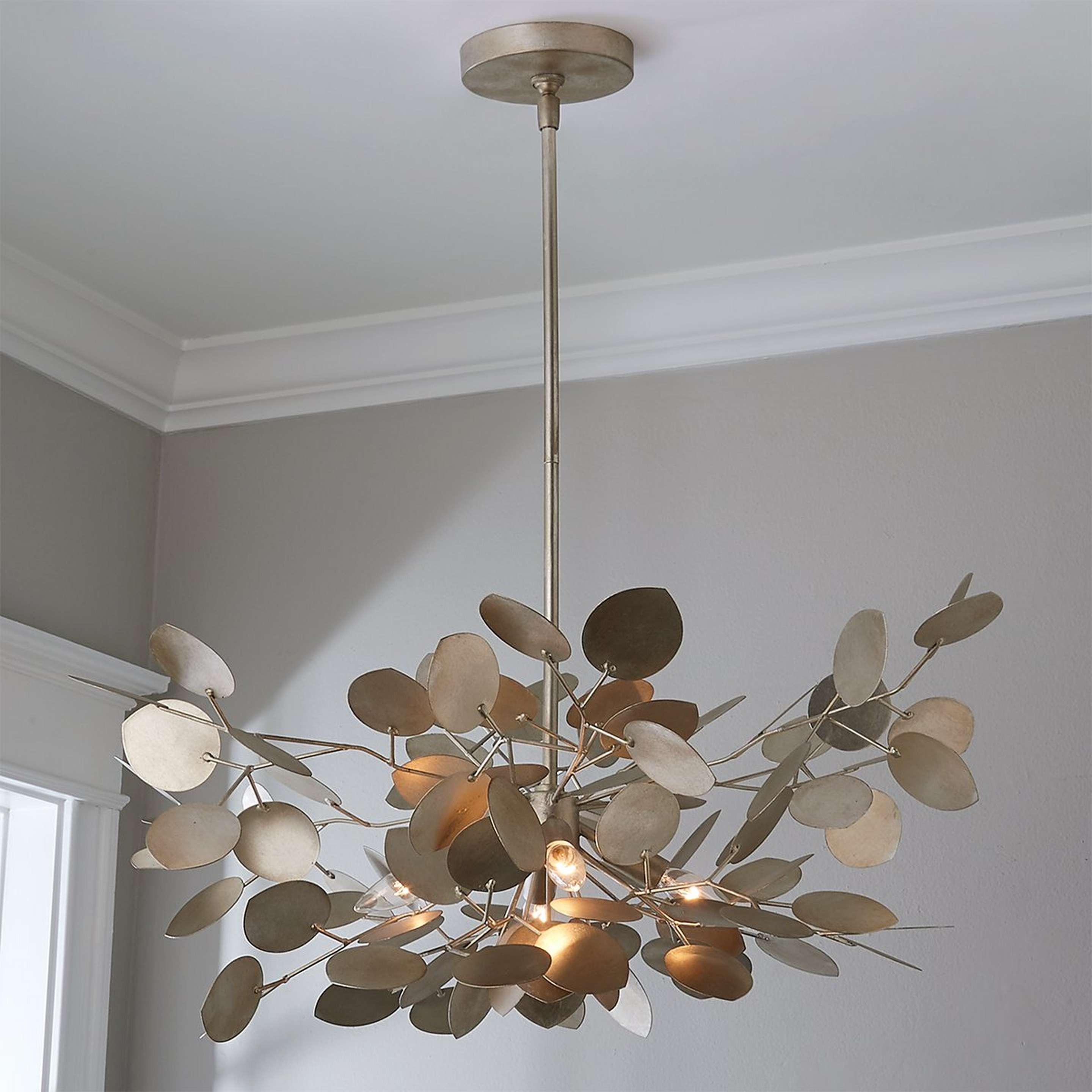 A Alana Convertible Chandelier with Silver Champagne color