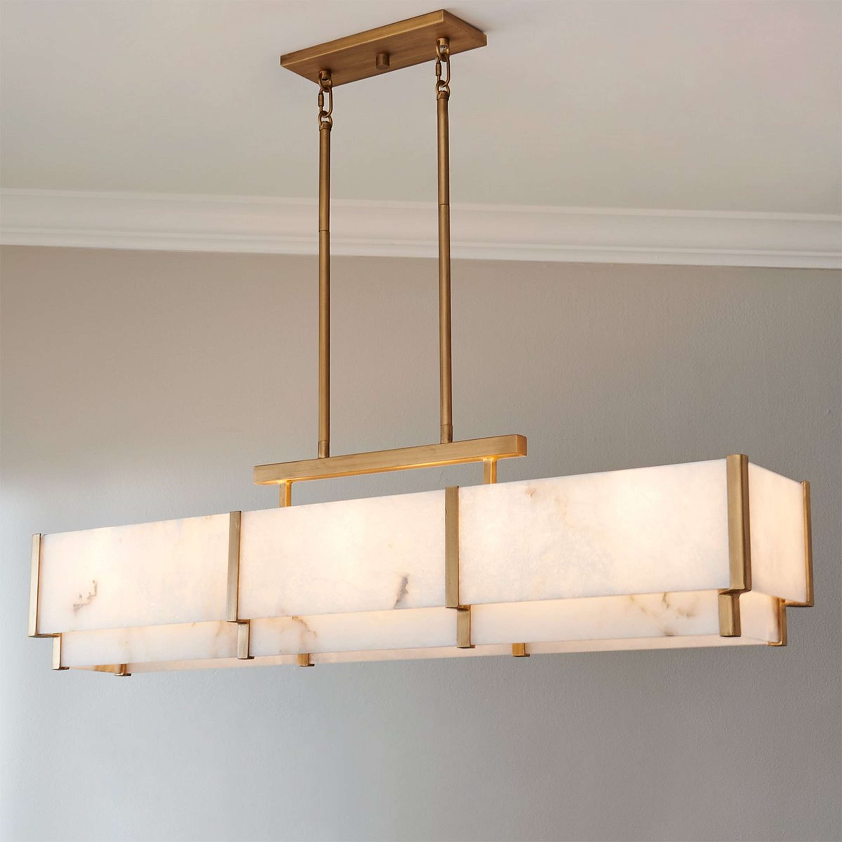 A Ruben Island Chandelier - 5 Light with Distressed Gold / Natural Alabaster color