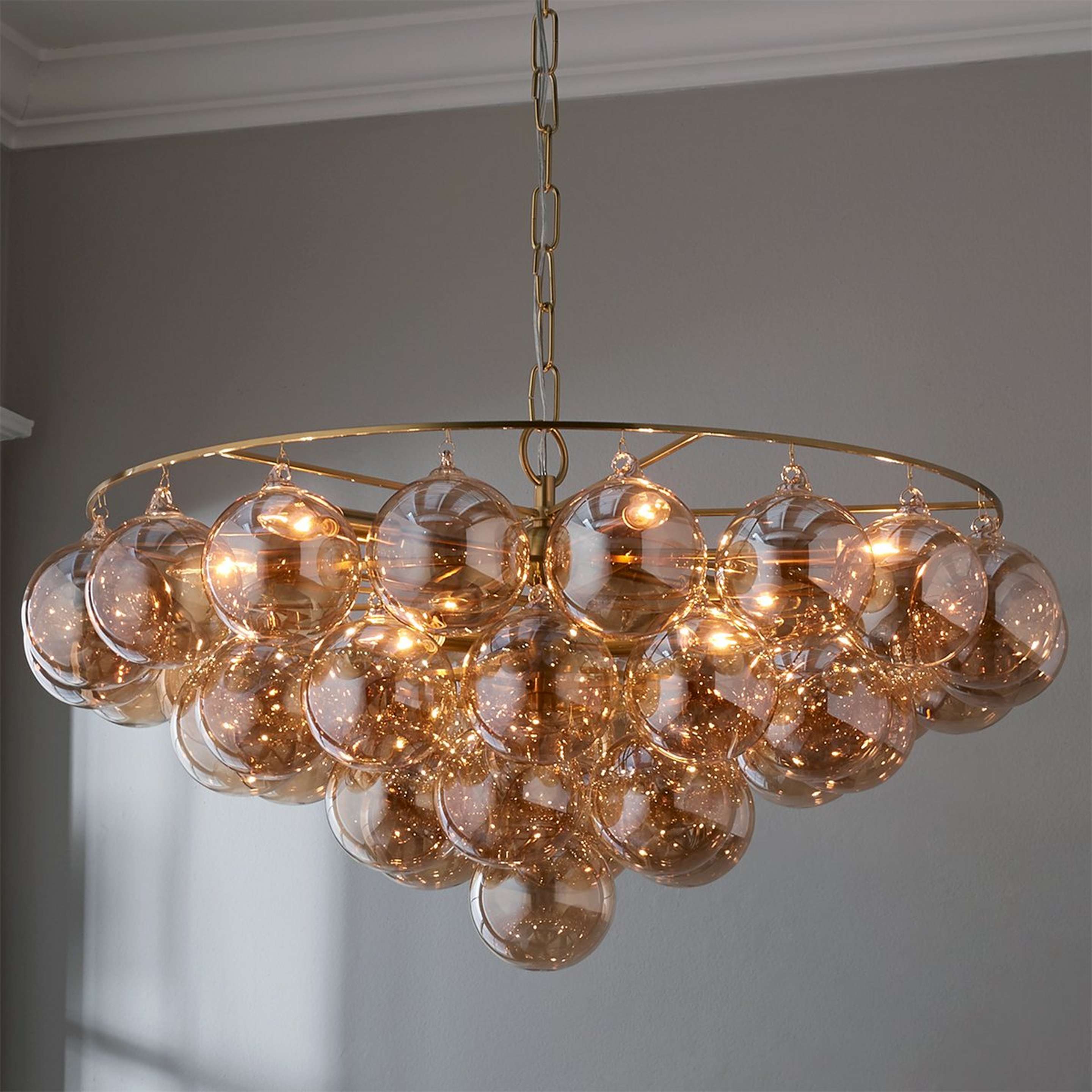 A Elodie Chandelier - 9 Light with Aged Brass / Champagne / Glass color