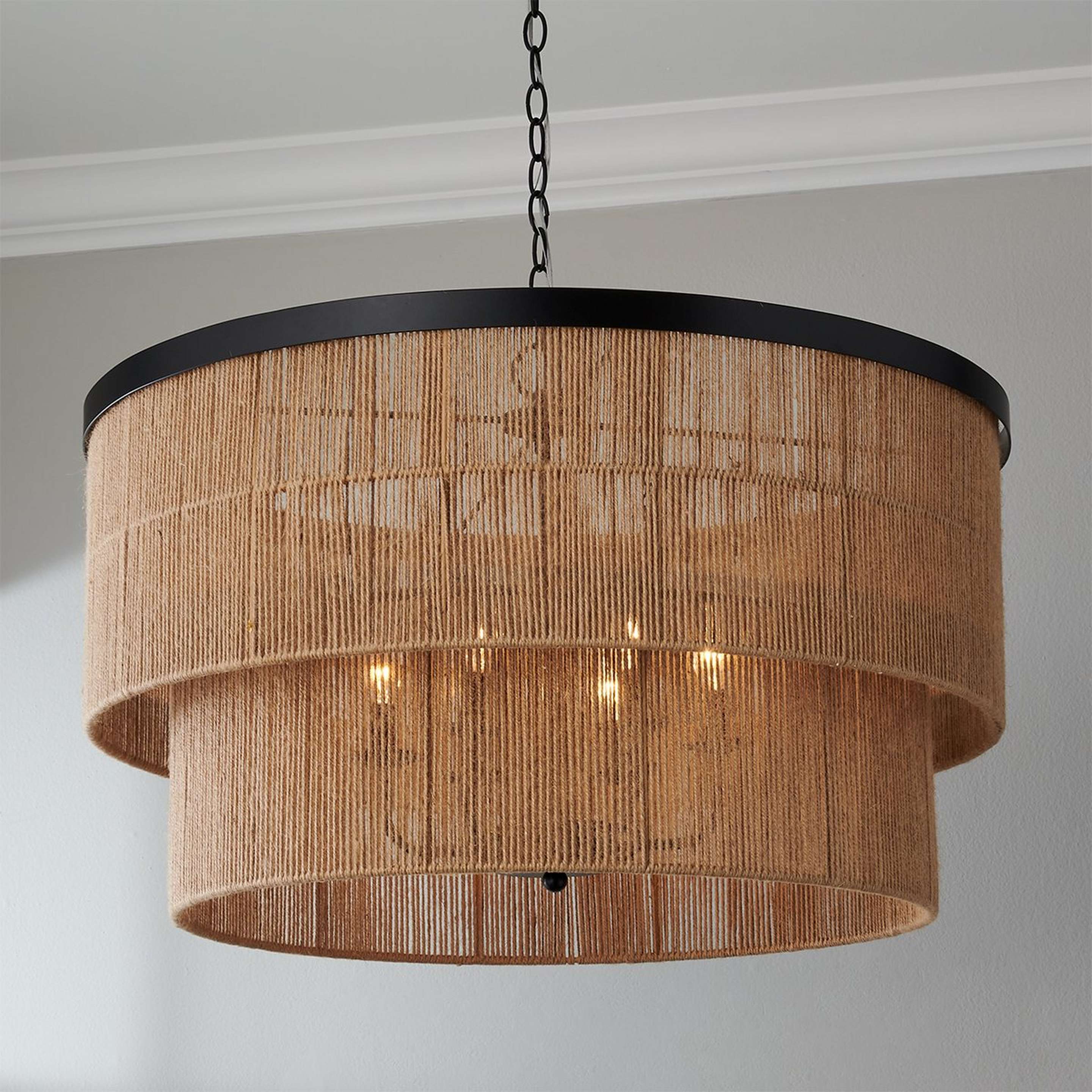 A Valdez Tiered Drum Chandelier with Matte Black / Natural Rope color