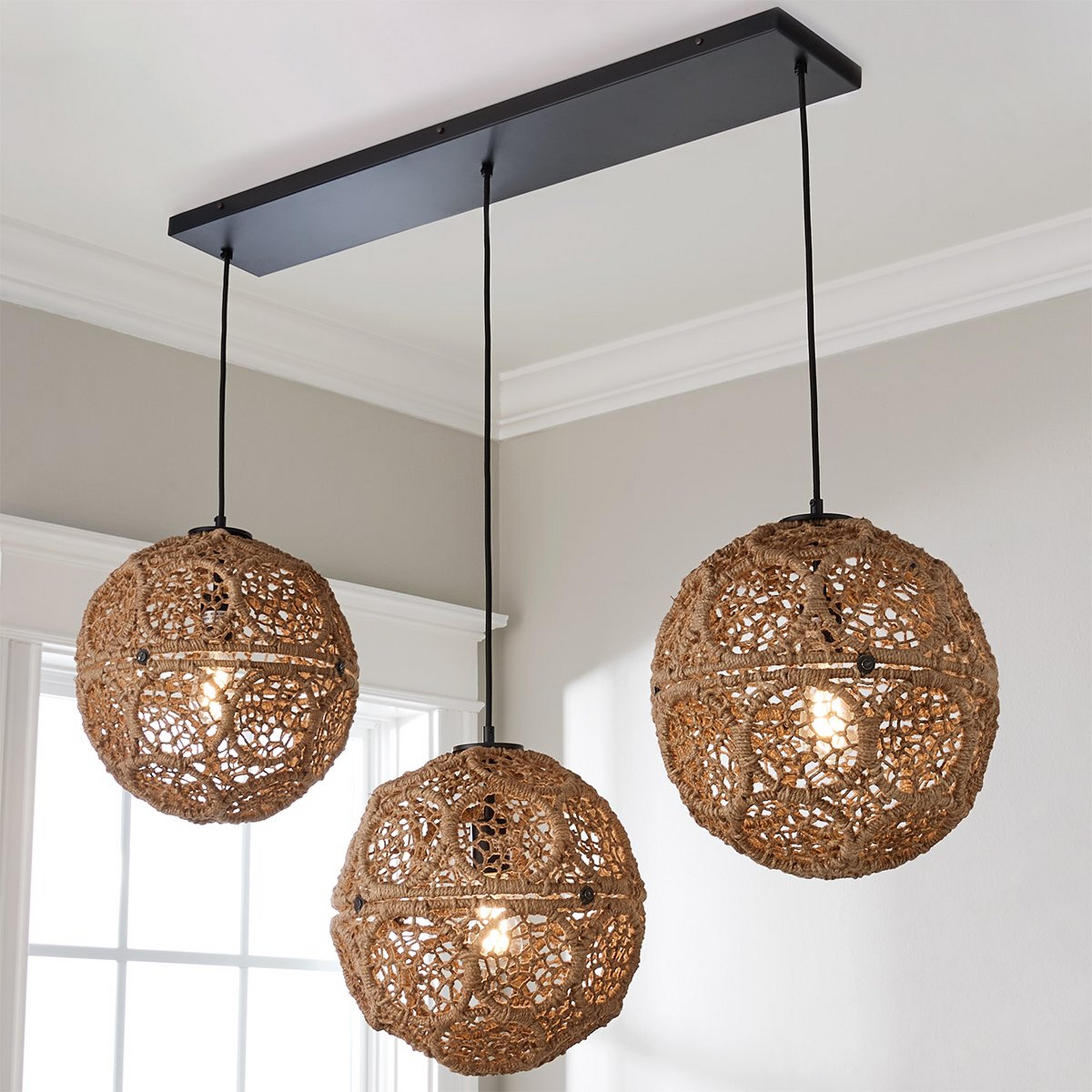 A Macrame Jute Sphere Linear Chandelier with Black / Natural Jute color