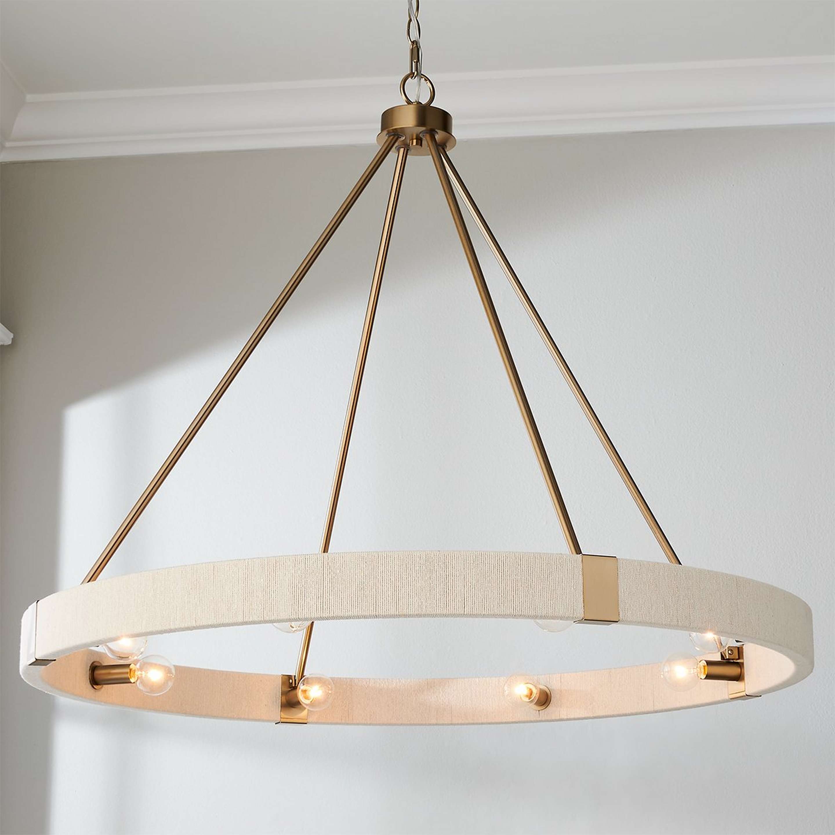A Kalini Chandelier - 8 Light with Matte Brass / Bleached Natural Rope color