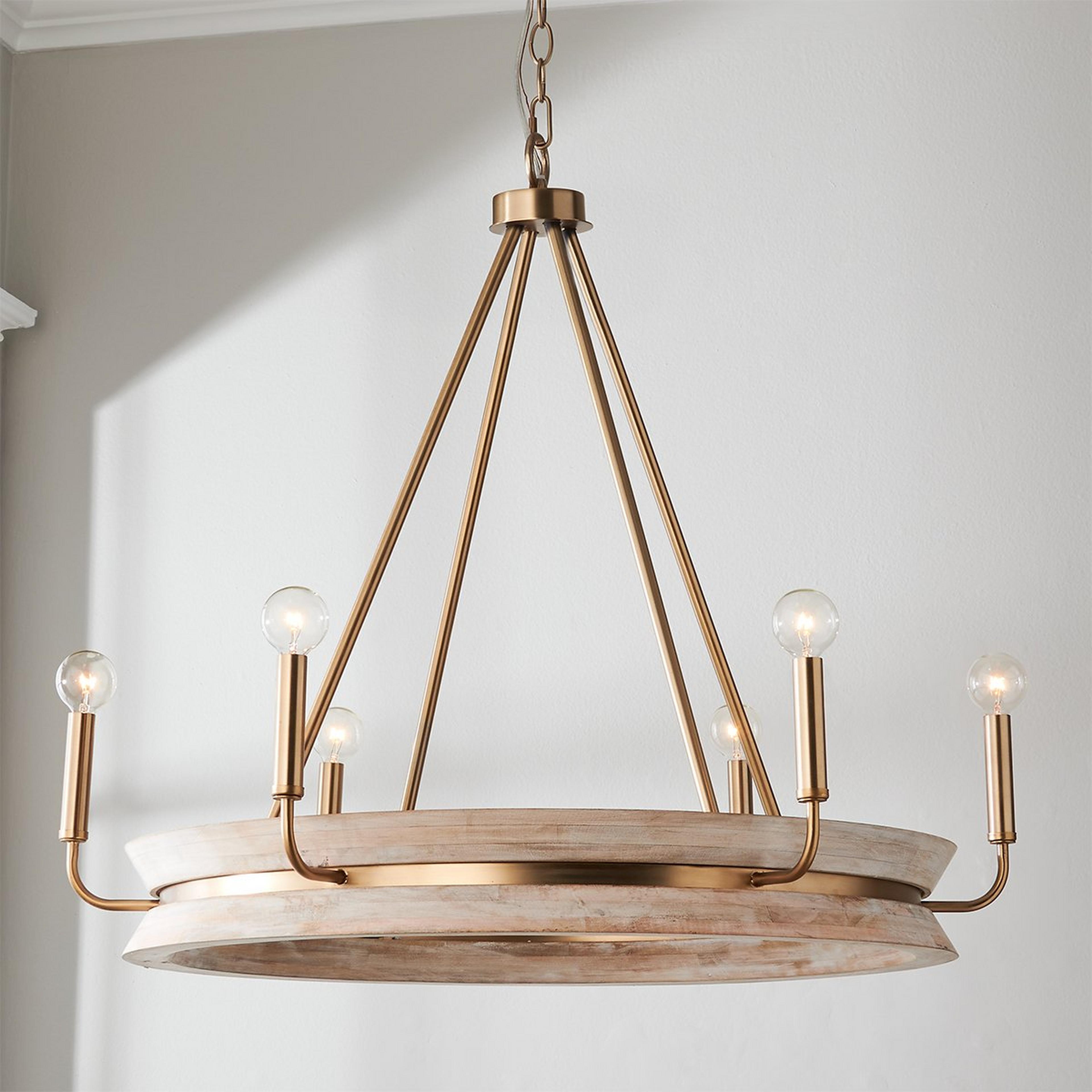 A Tajani Chandelier with Matte Brass / Whitewashed Mango Wood color