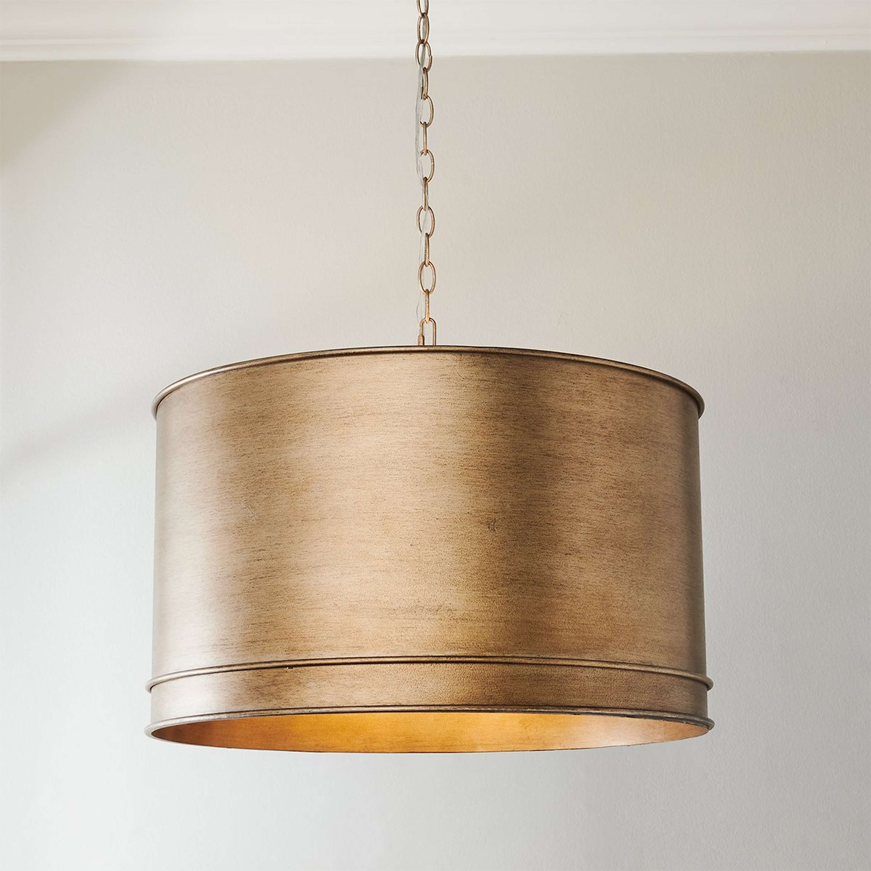 A Bon Luminar Drum Chandelier with Aged Gold color