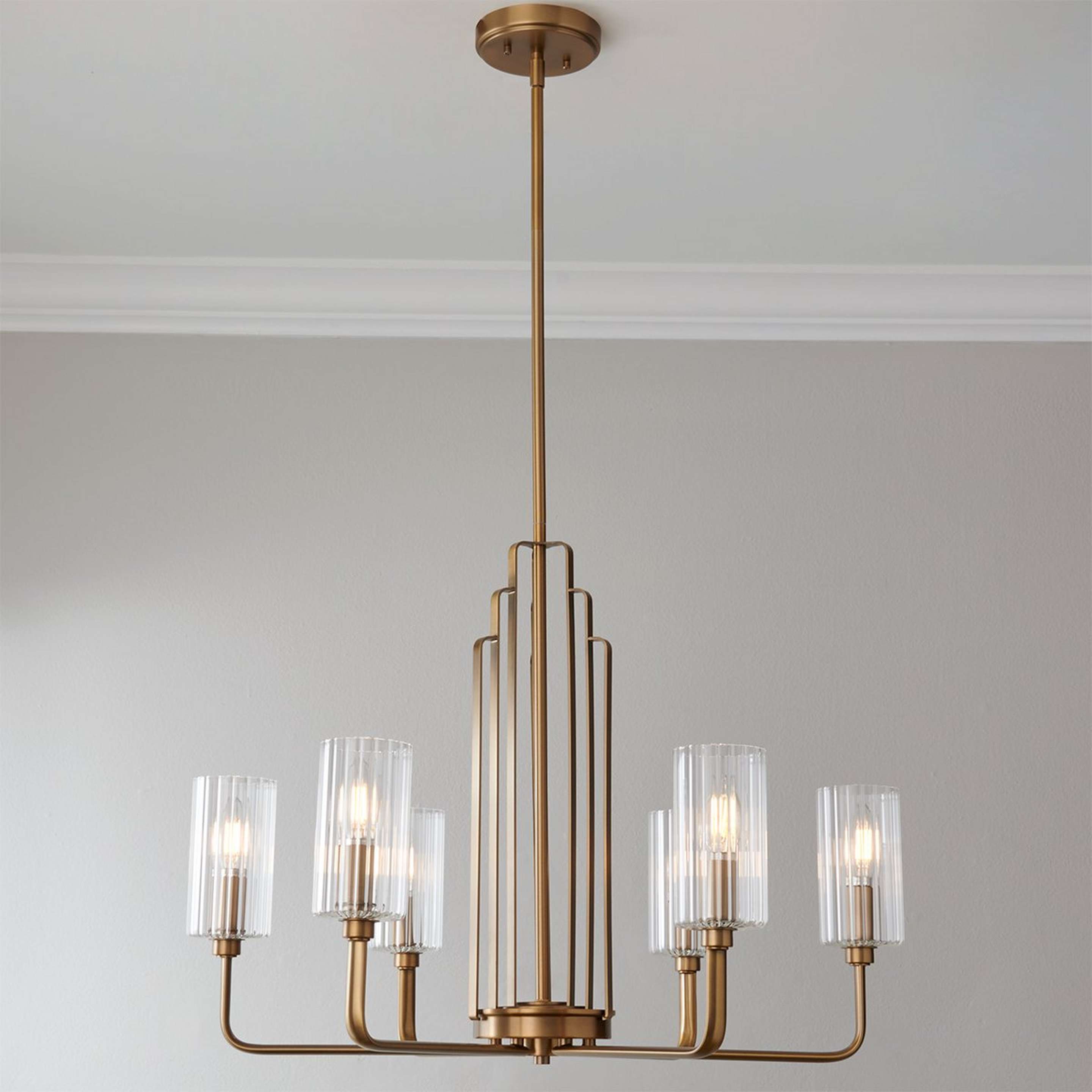 A Wunderly Chandelier - 6 Light with Brushed Brass / Clear Fluted Glass color