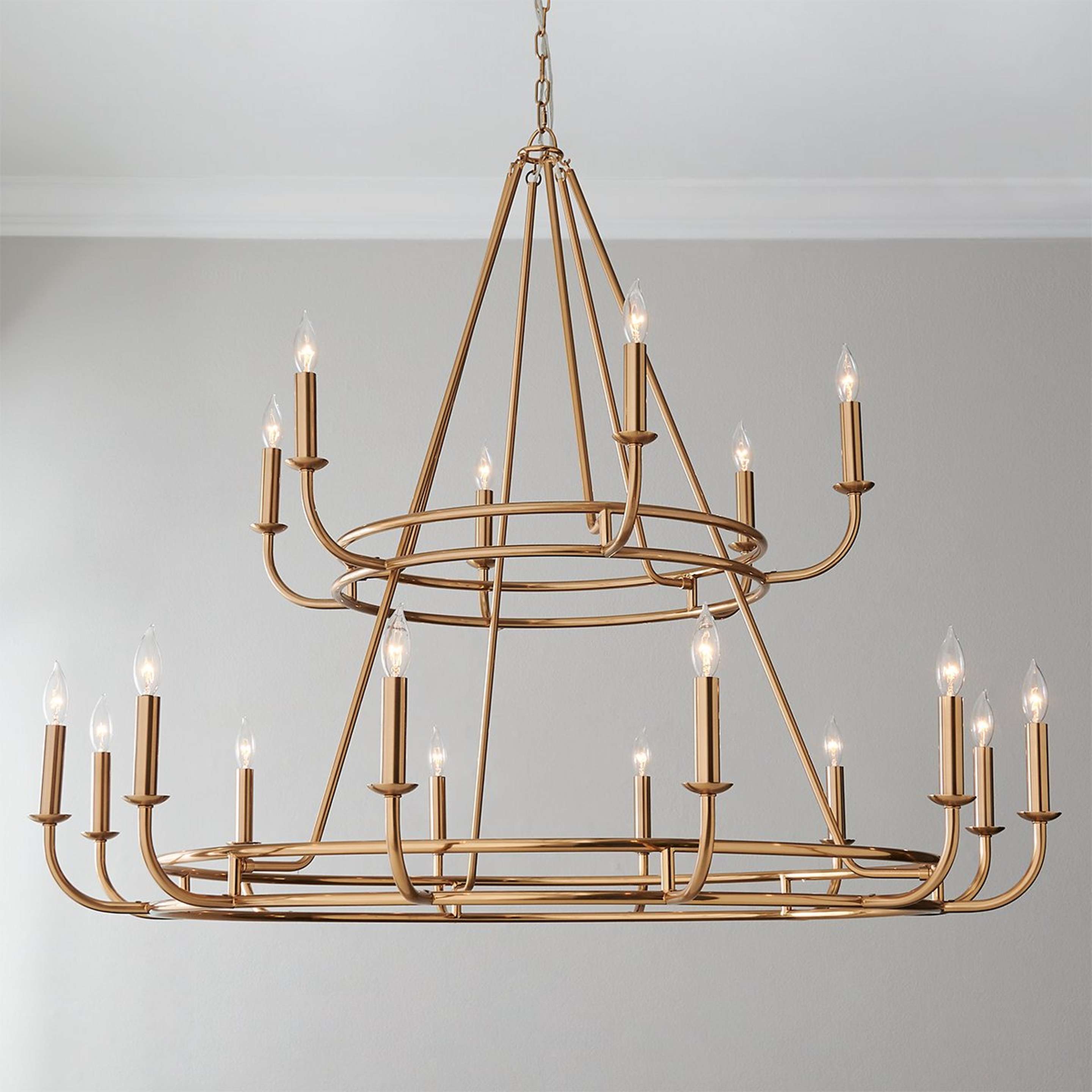 A Moderately Modern Two-Tier Chandelier with Aged Brass color