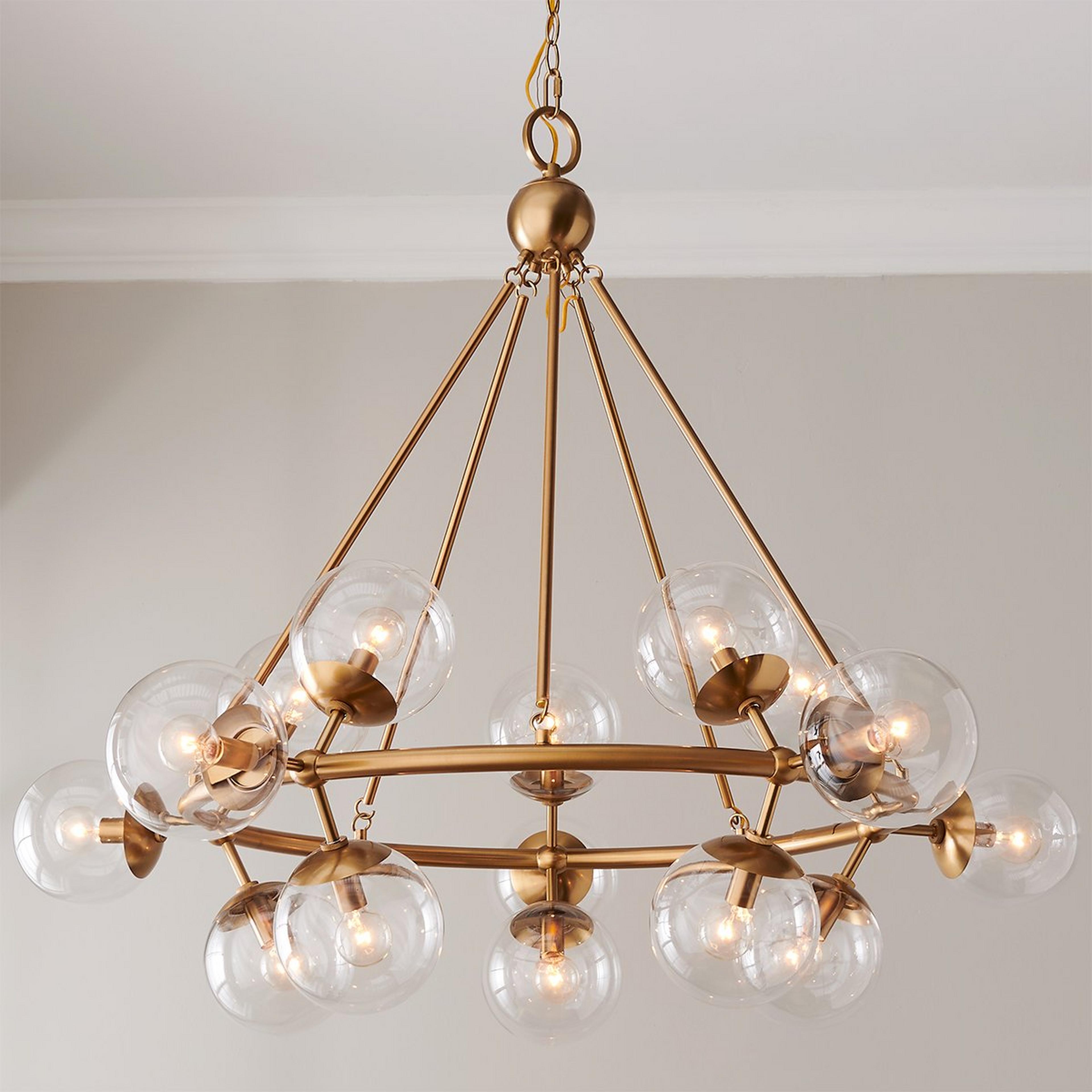 A Pondering Chandelier with Brass / Clear Glass color