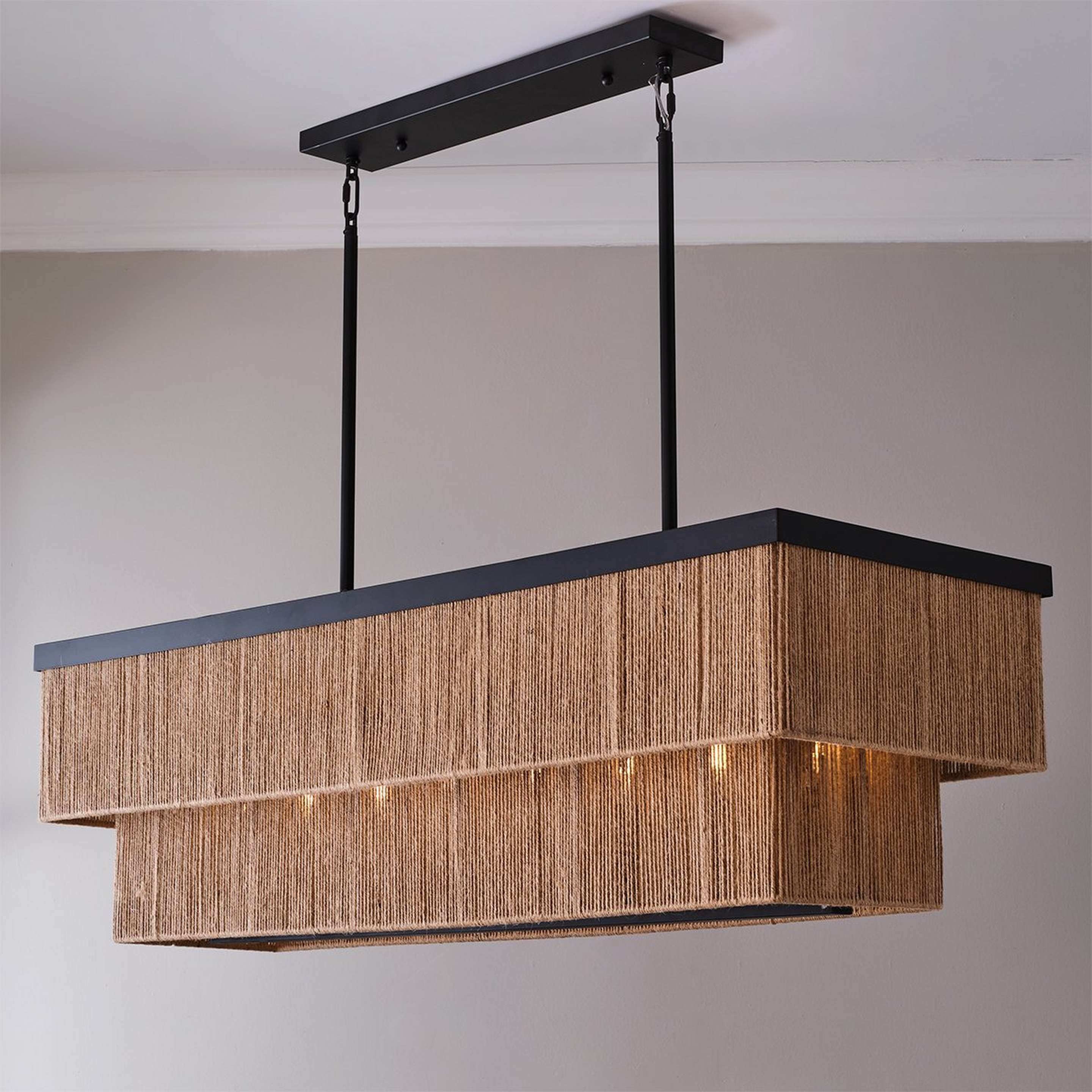 A Diani Island Chandelier with Black / Natural Rattan color