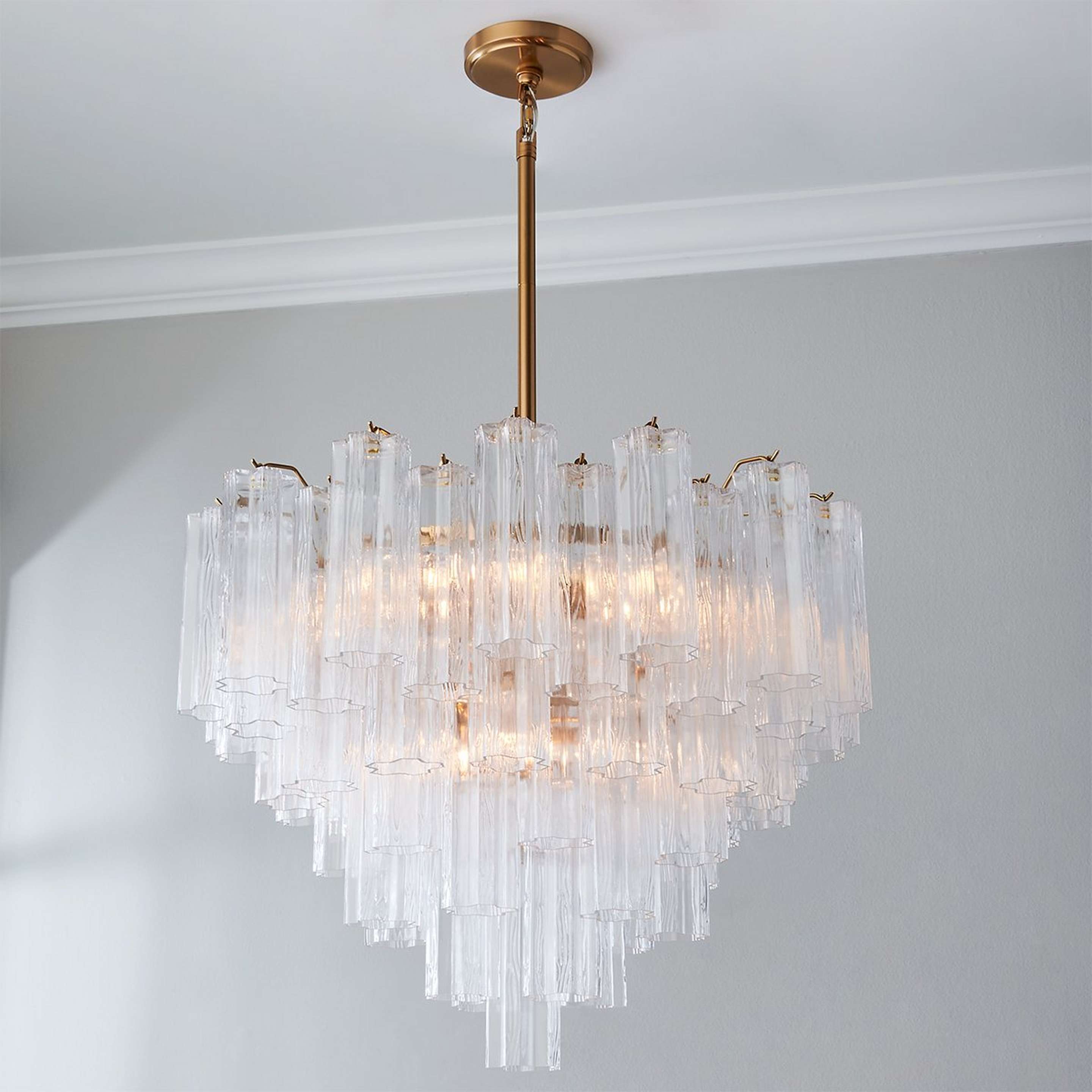 A Imondo Chandelier - 12 Light - Clear with Aged Brass / Clear Tronchi Glass color
