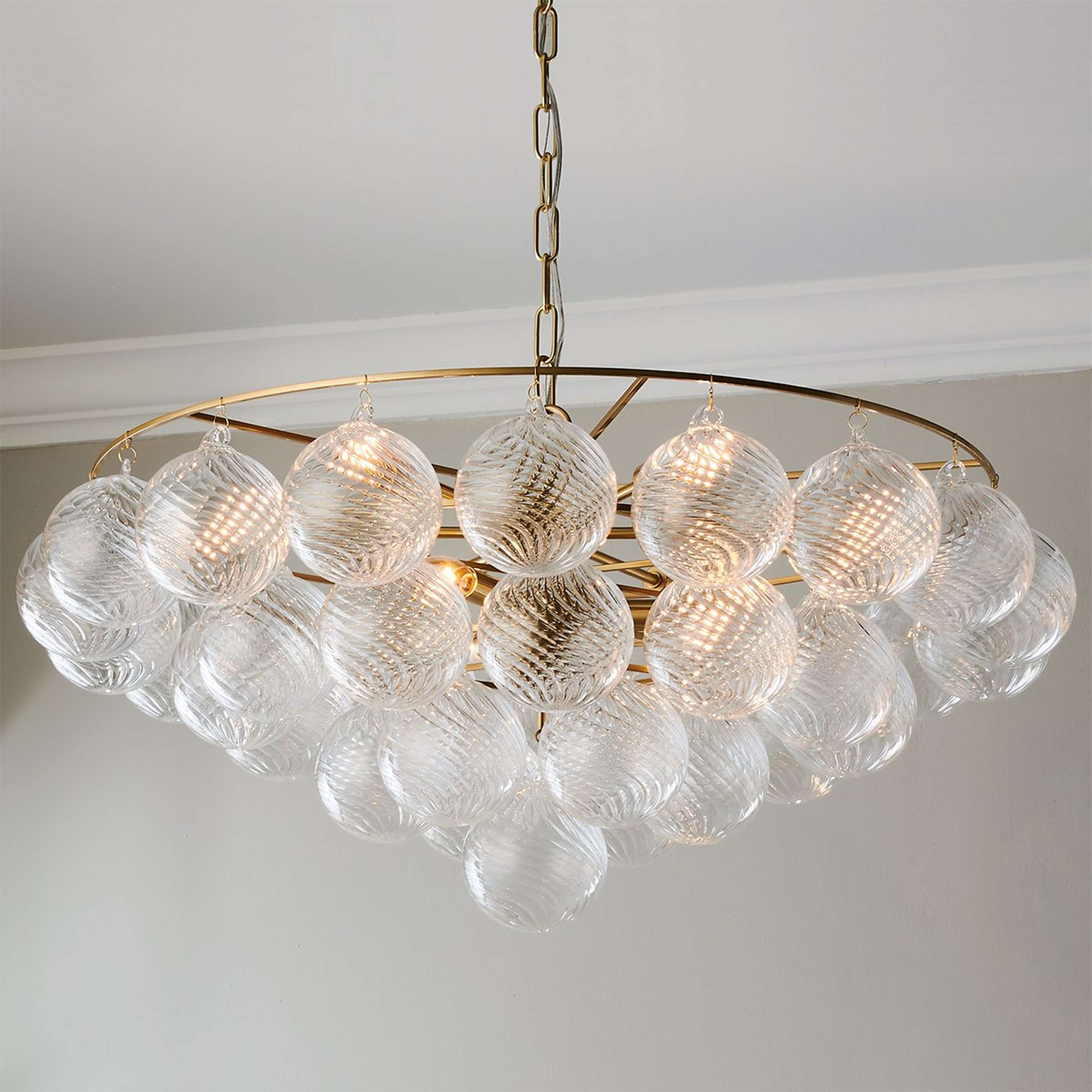 A Elodie Chandelier - 9 Light - Clear with Aged Brass / Clear Glass color