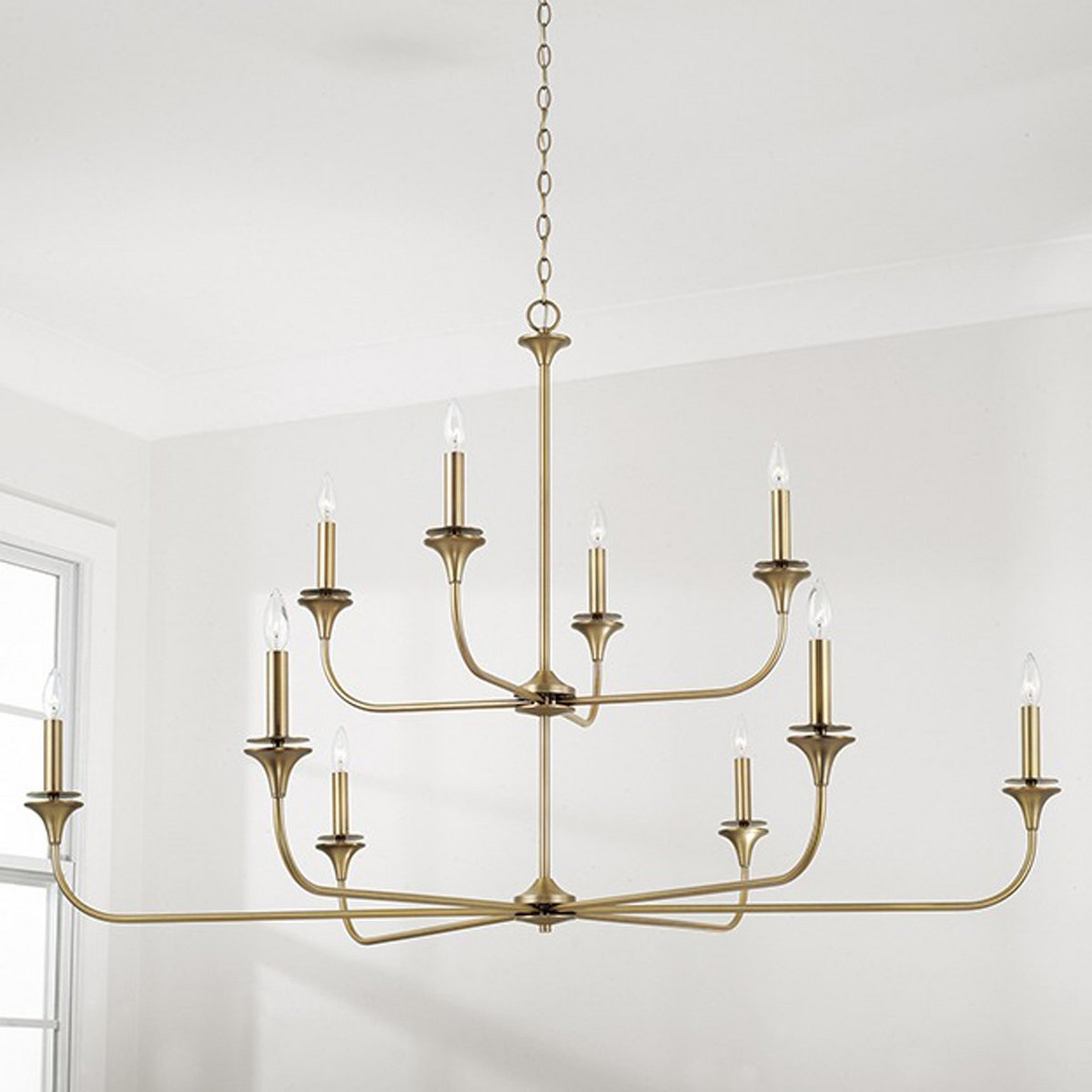 A Mayhue Two-Tier Chandelier with Aged Brass color