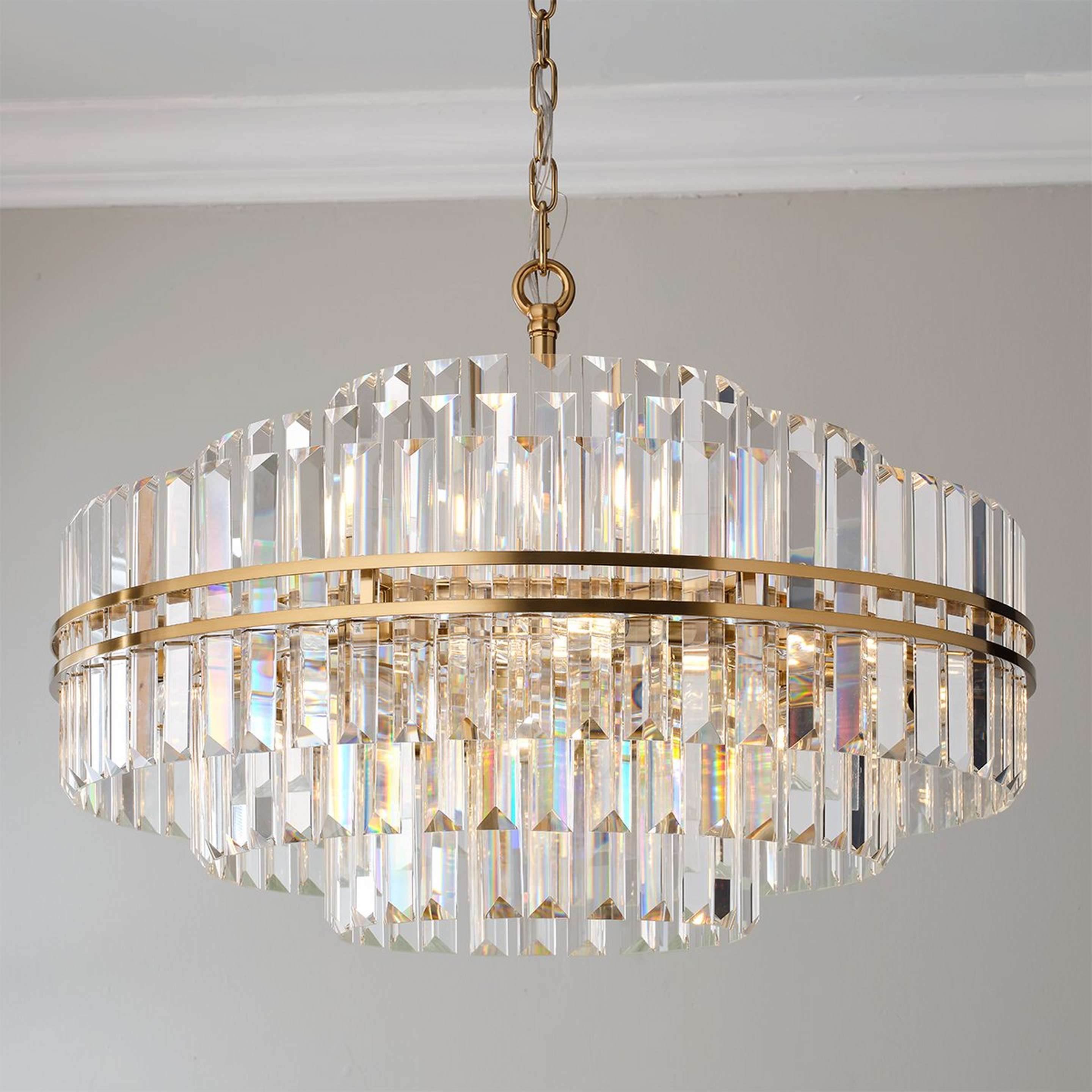 A Faceted Regina Chandelier - 16 Light with Aged Brass / Crystal color