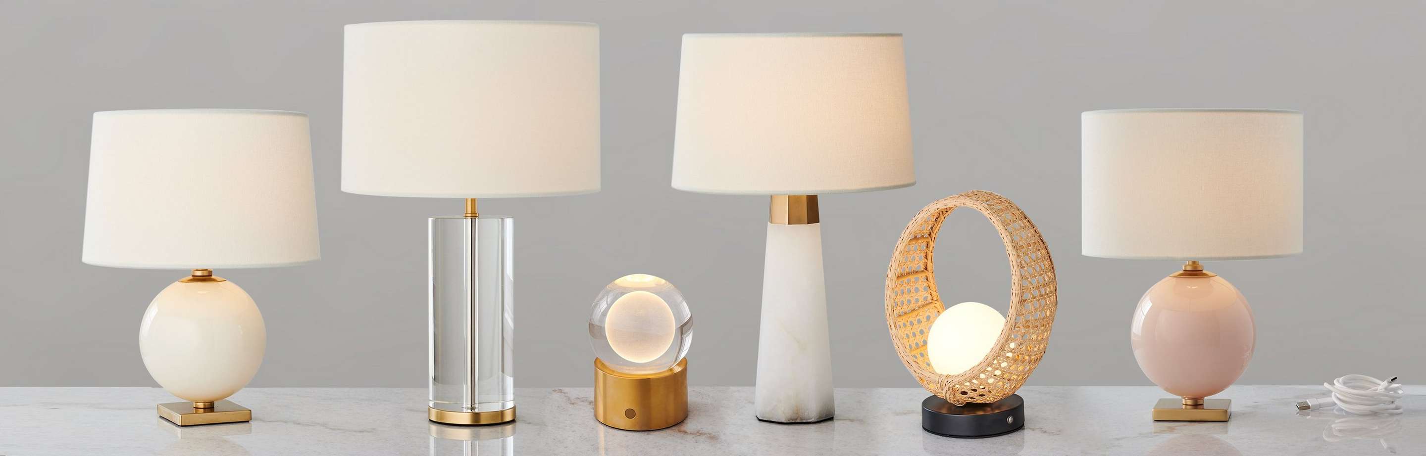 Collection of  Cordless Table Lamps on a marble counter