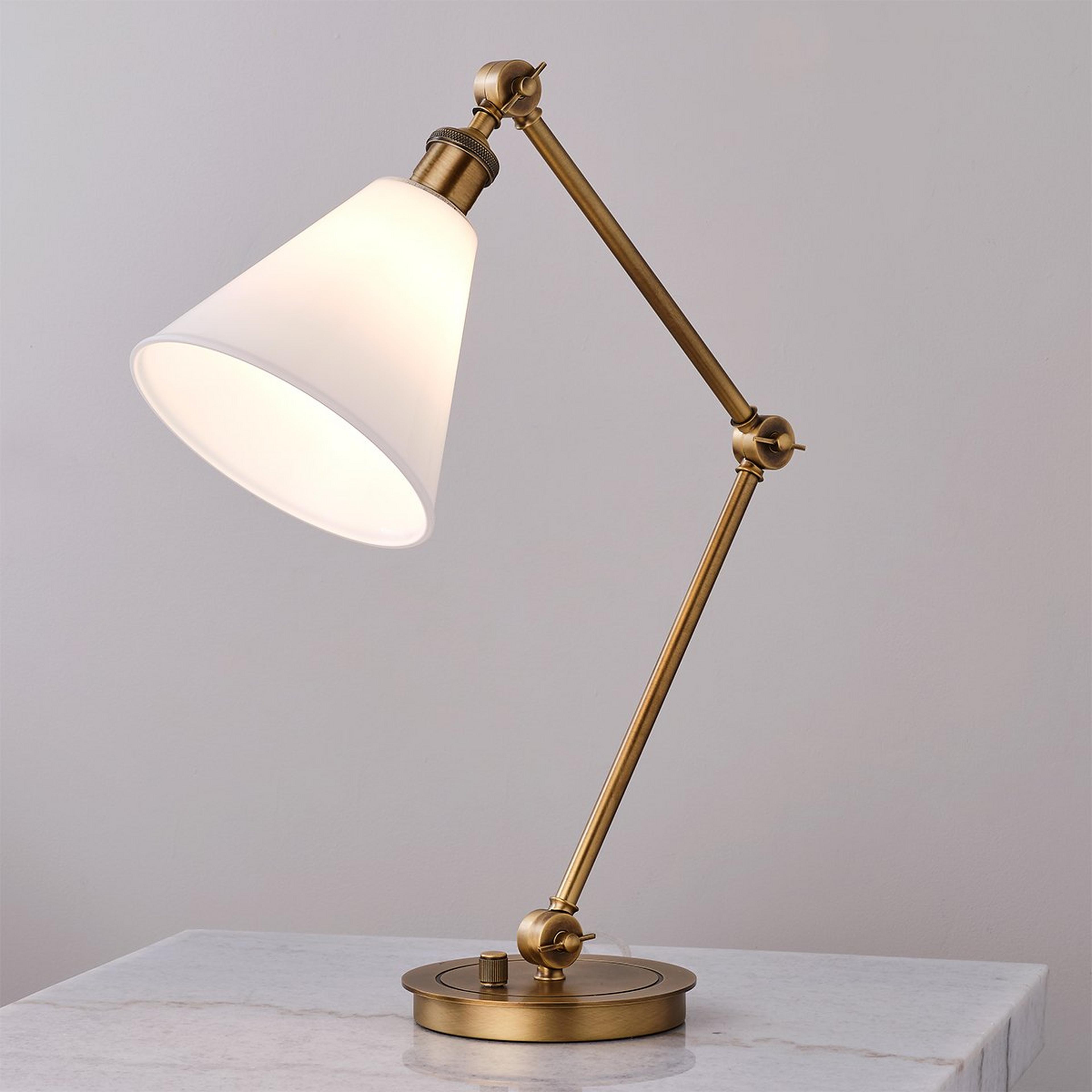 A Milo Desk Lamp with Brass / White color