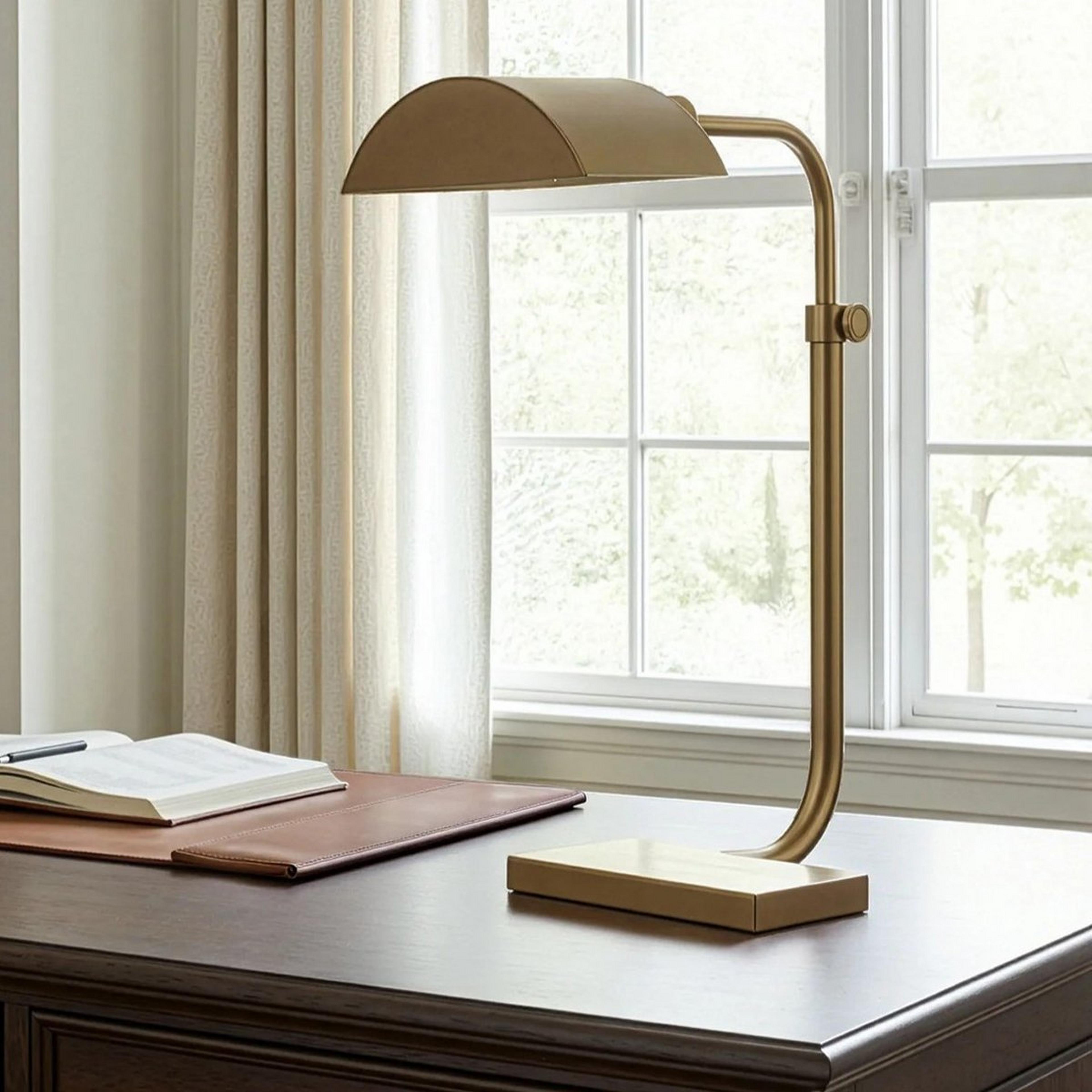 A Contemporary Curve Desk Lamp with Brass color