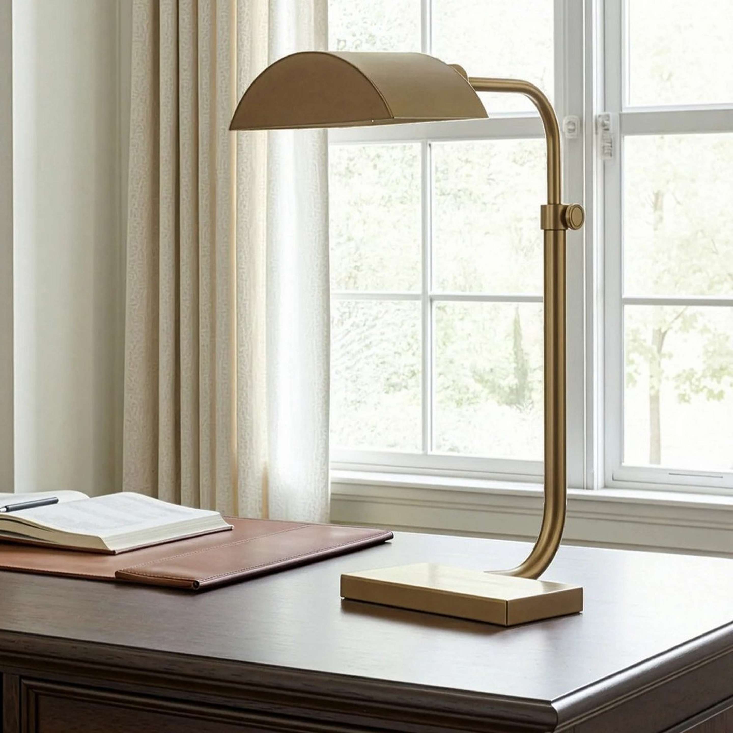 A Contemporary Curve Desk Lamp with Brass color