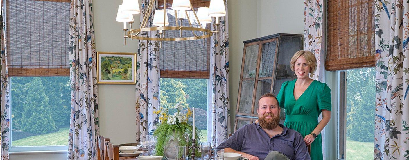 Erin and Ben Napier in a dining room with the Watkins chandelier