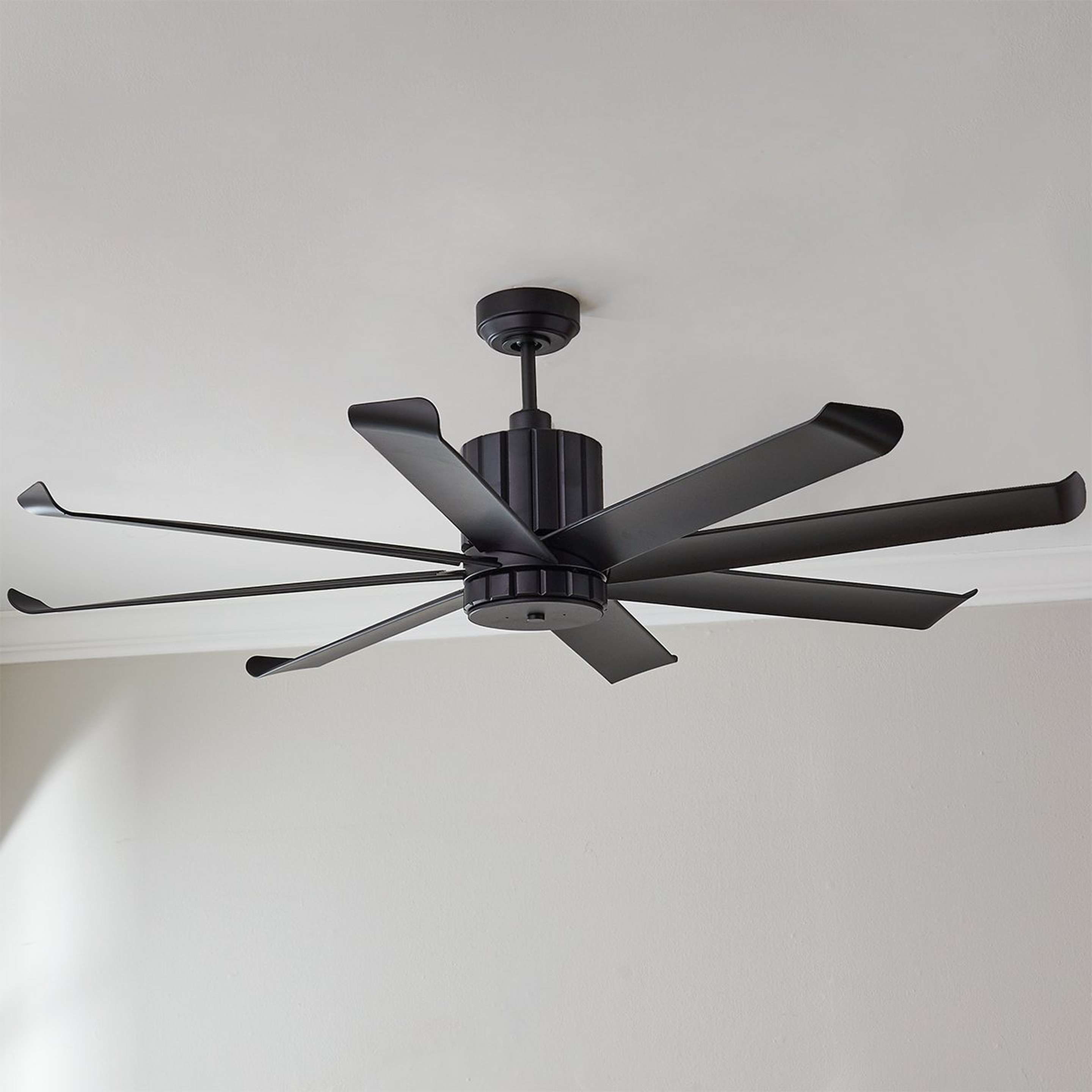 A 60" Angled Spoke Indoor / Outdoor Ceiling Fan with Matte Black color