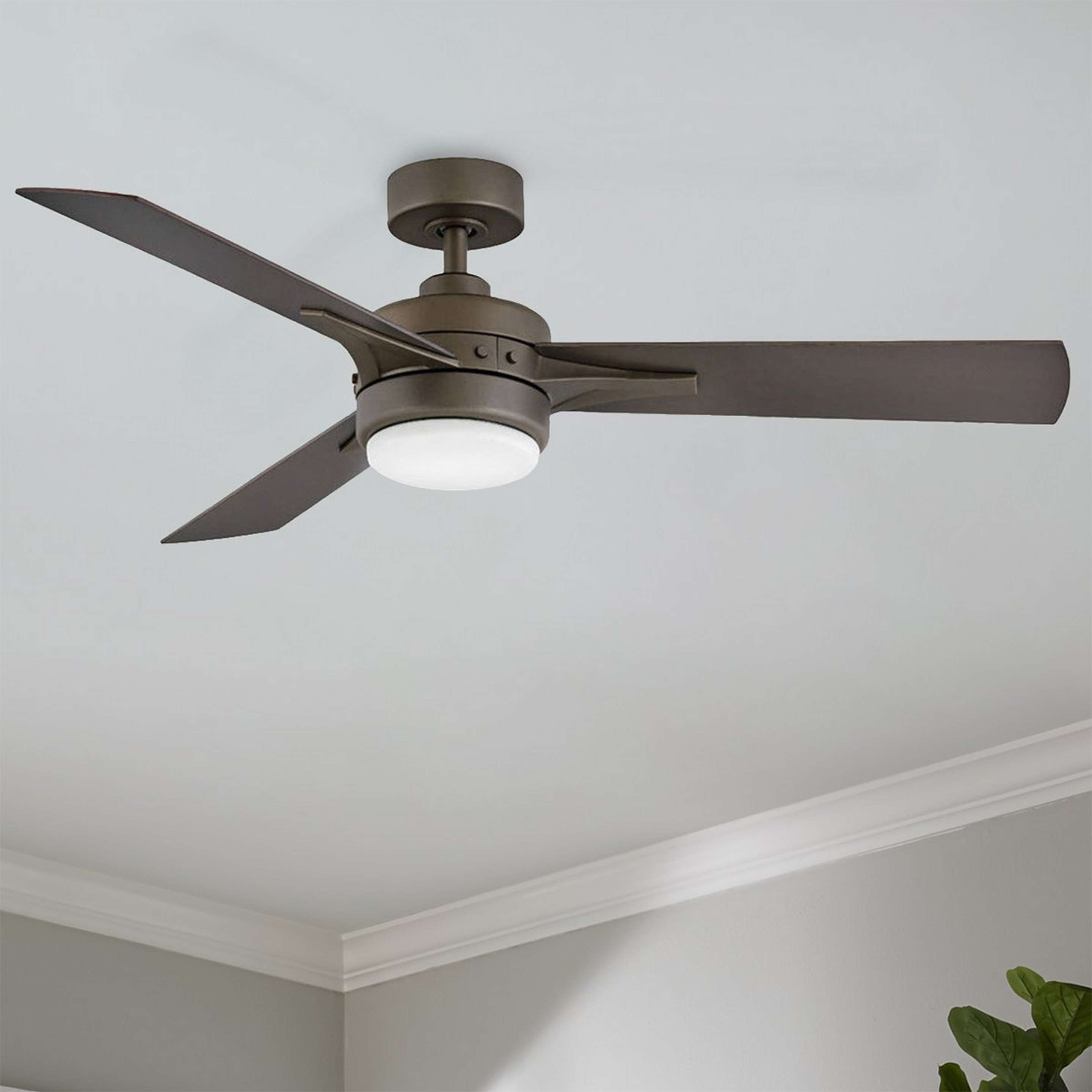 A 52" Urban Rivet LED Ceiling Fan with Metallic Matte Bronze / Dark Wood color