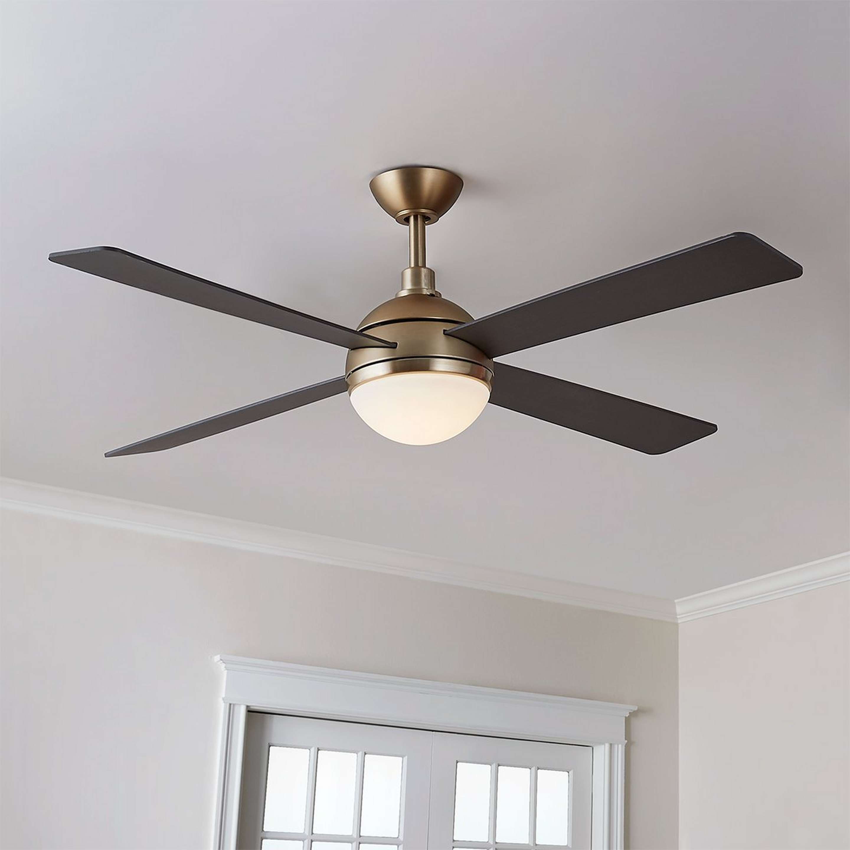 A 54" Modern Globe LED Ceiling Fan with Brushed Brass / Brass / Gray color