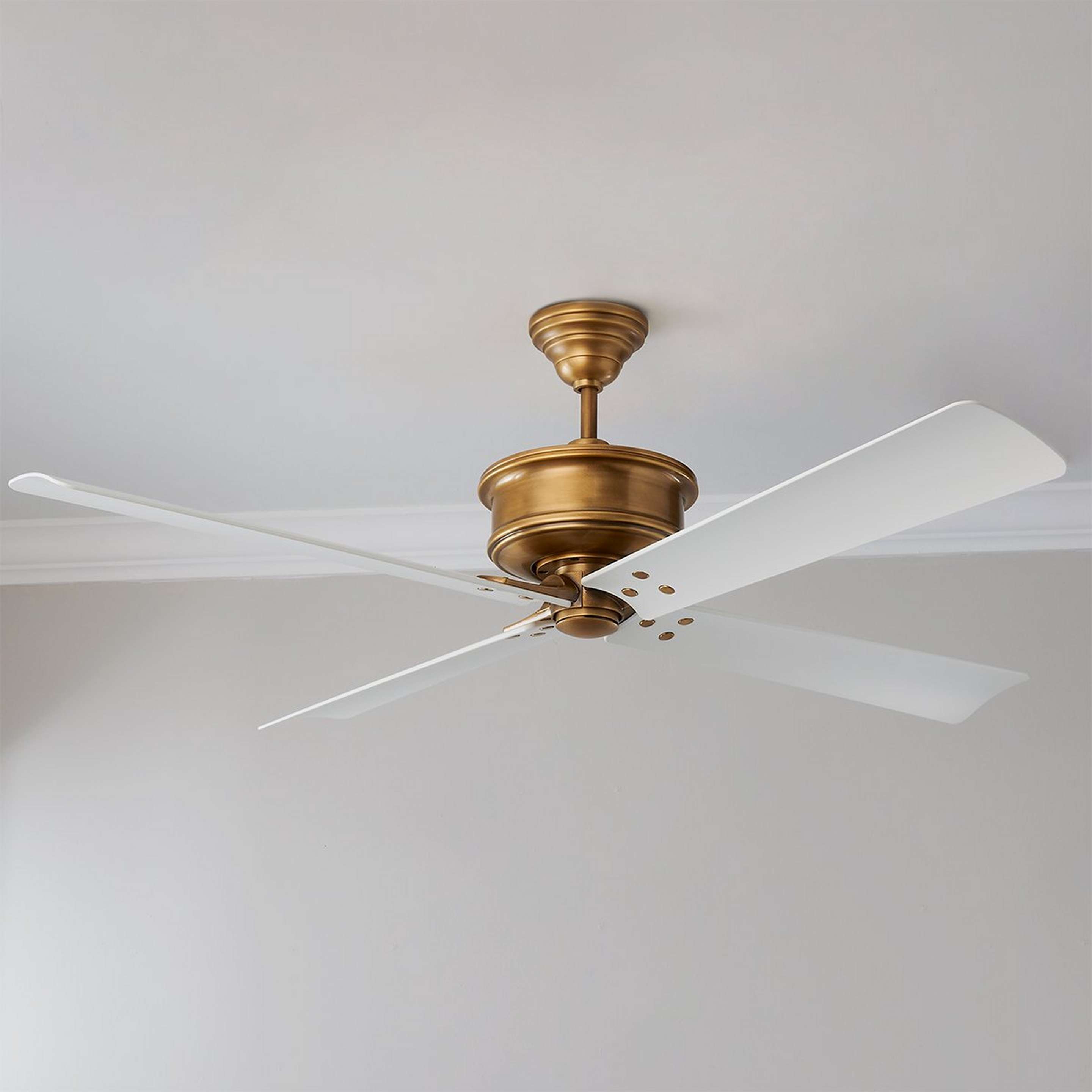 A 56" Daybreak Ceiling Fan with Antique Brass / Matte White color