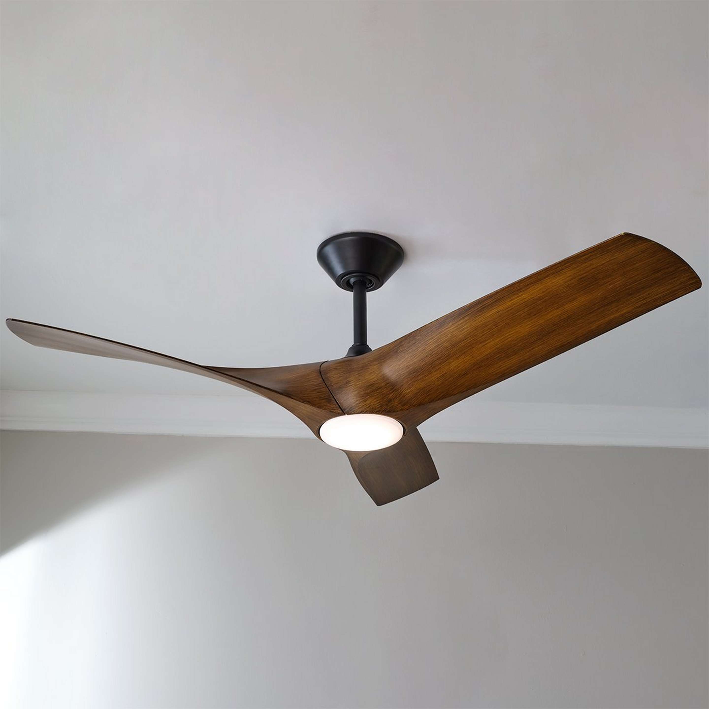 A 52" Meza Indoor / Outdoor Smart LED Ceiling Fan with Black / Faux Distressed Koa color