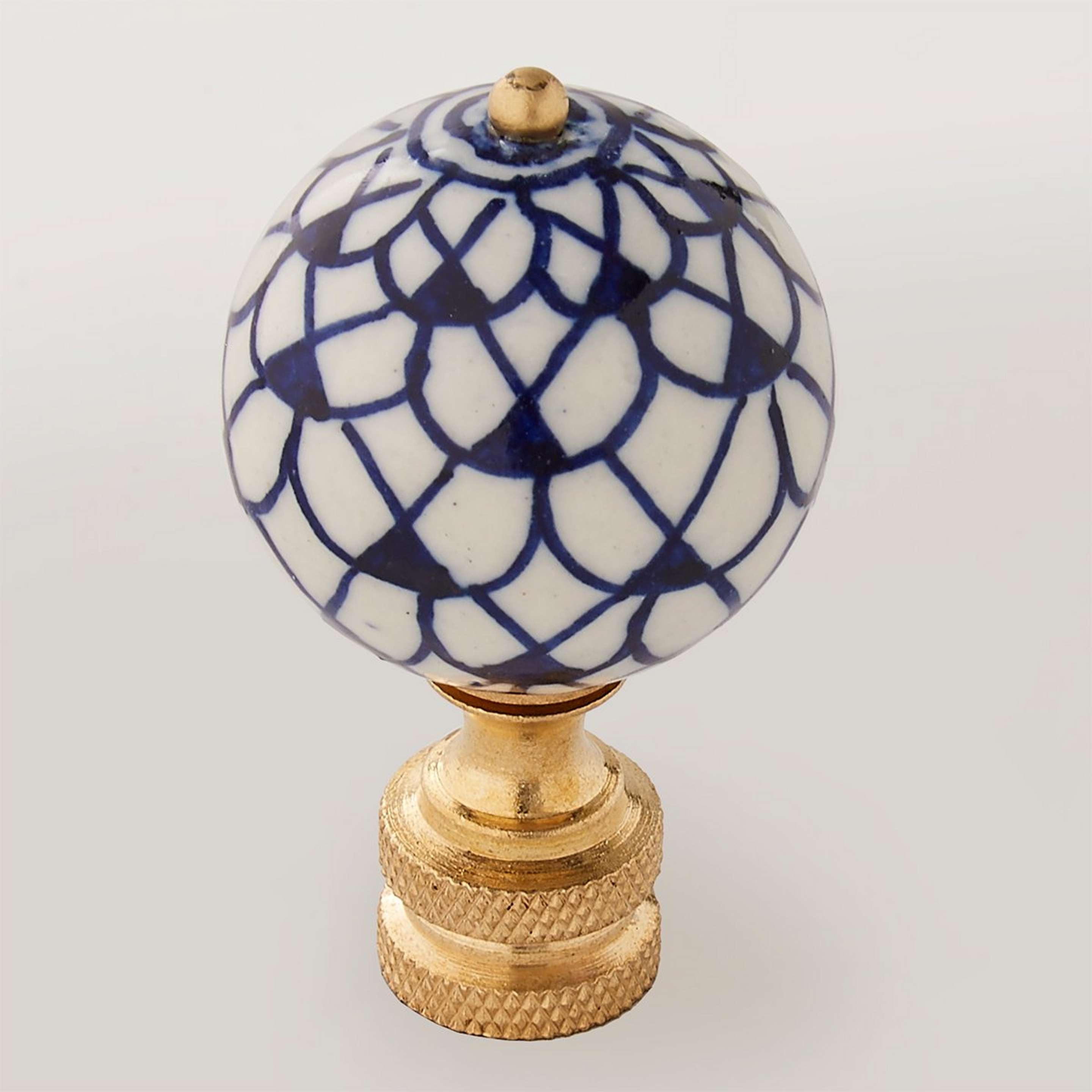 A Feathered Porcelain Finial with Blue / White / Brass color
